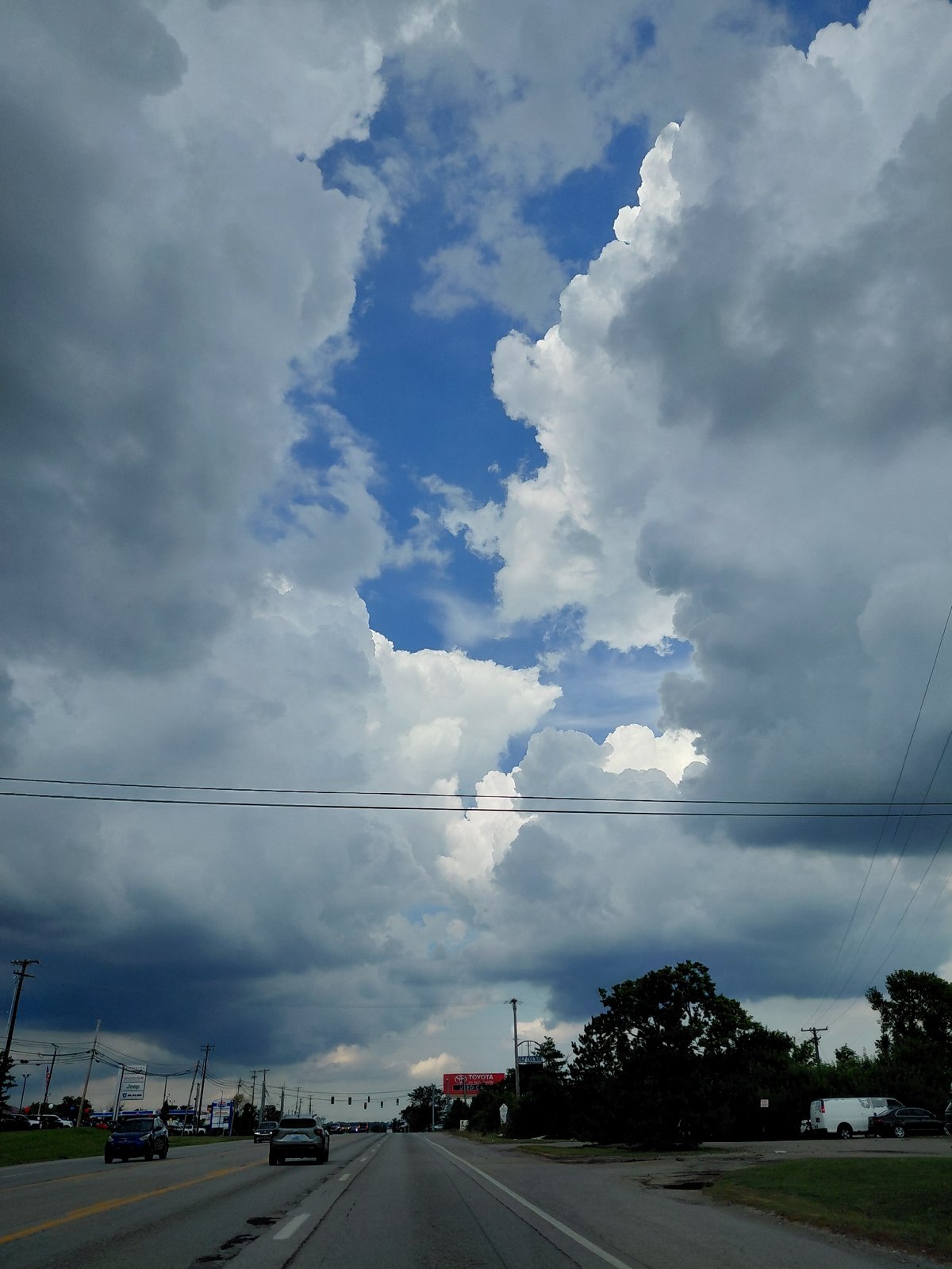 Storm clouds part over a Nicholasville road trip