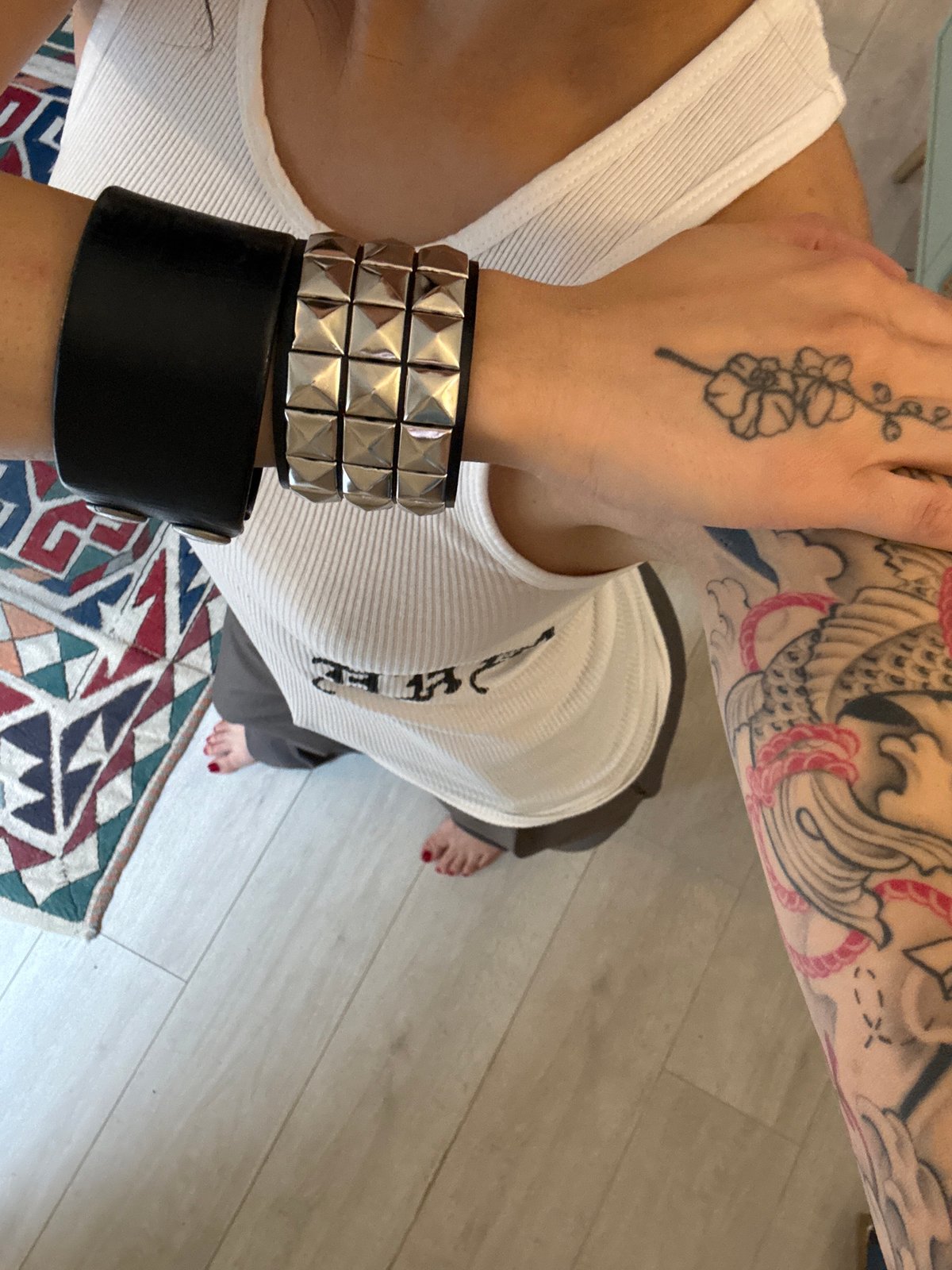 Tattooed individual photographed from overhead in London
