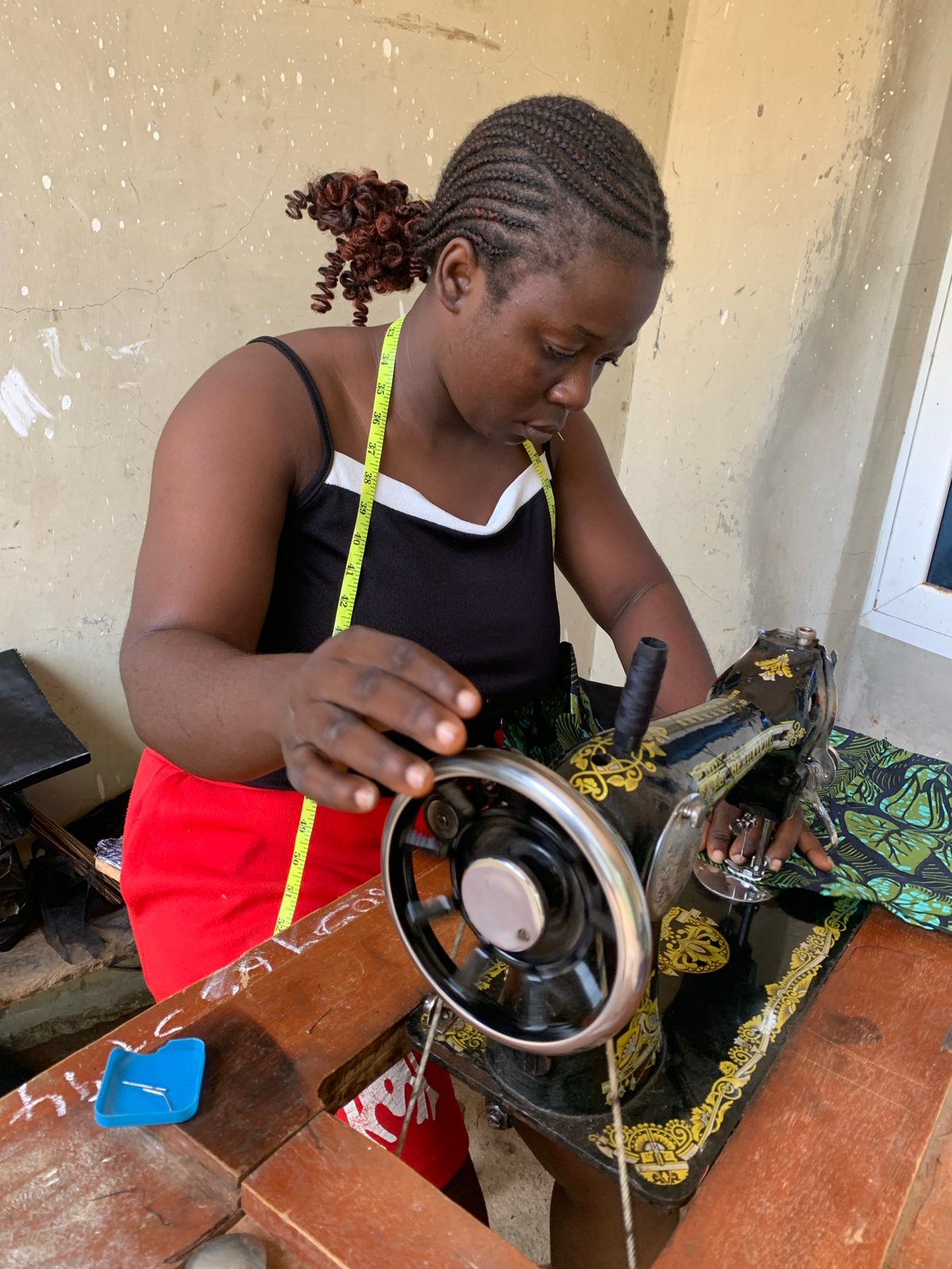 Roadside tailoring session in Akwanga, Nigeria