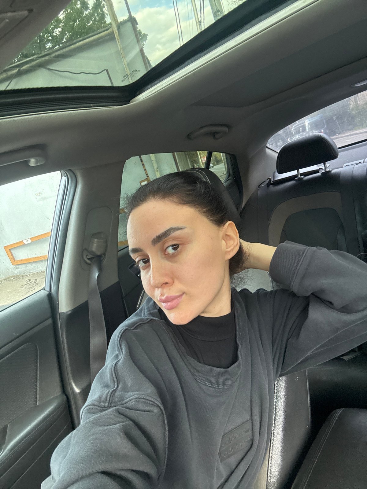 Person travels through Tbilisi streets during afternoon hours