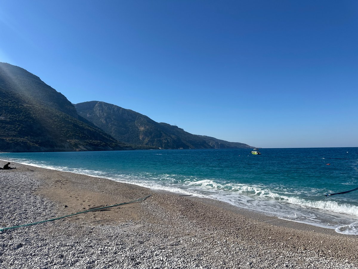 Morning beach scene with tourist boats in Fethiye, Turkey