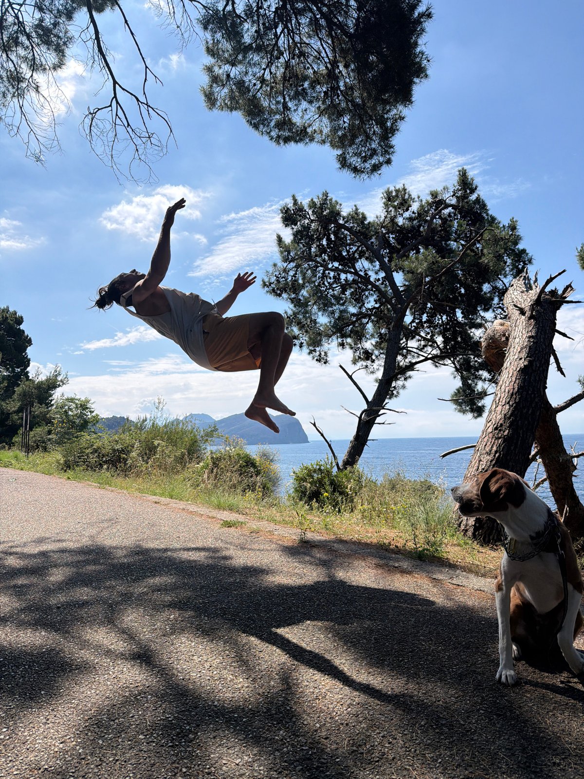 Athletic man performs aerial stunt in Montenegro coastal town