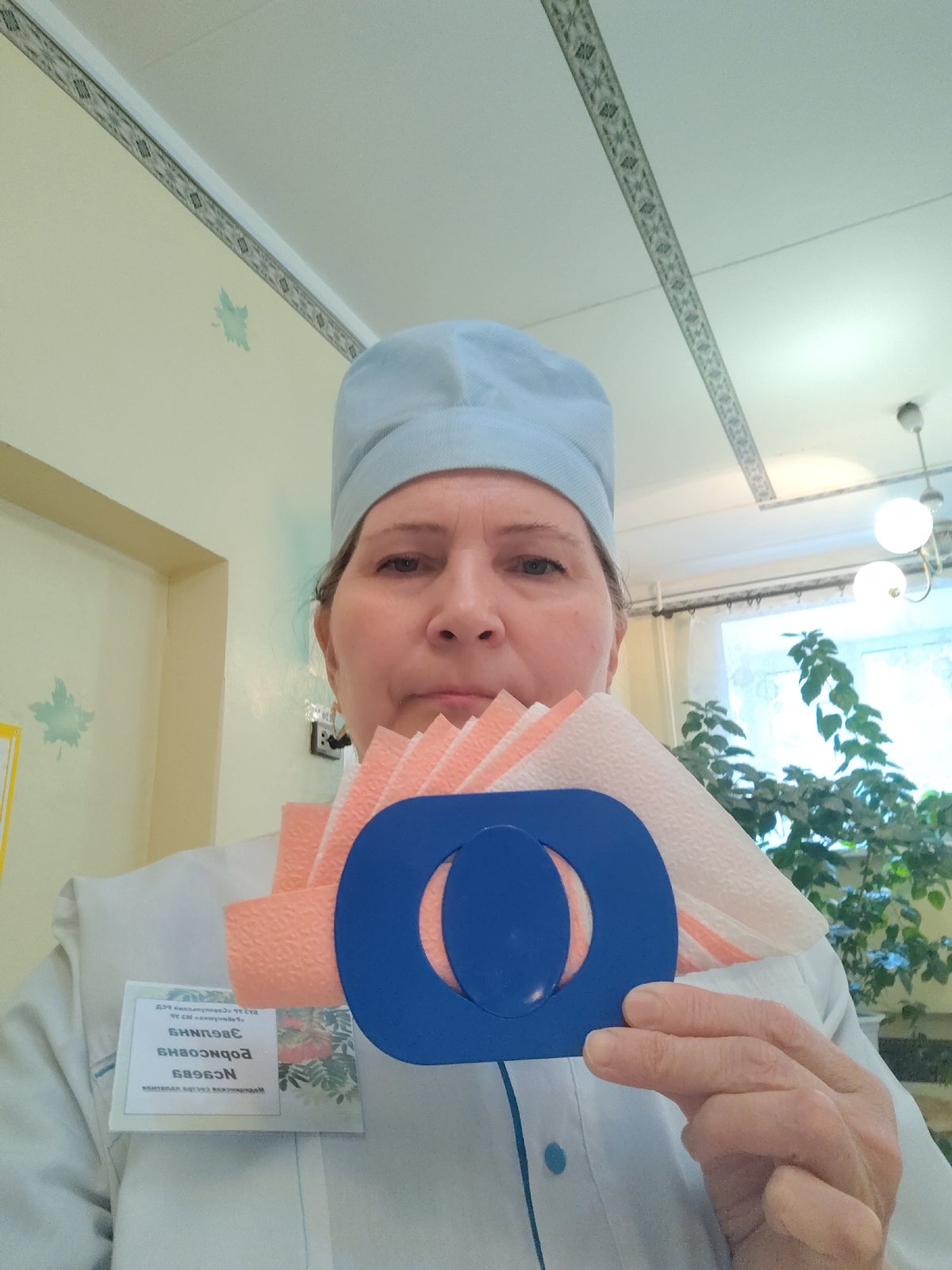 Healthcare worker documented during routine activities in Sarapul workplace