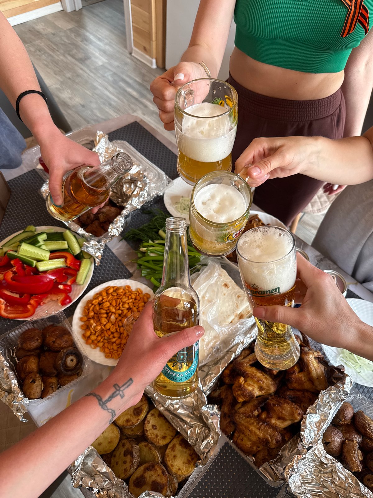 Social gathering with food and drinks observed in Krasnoyarsk