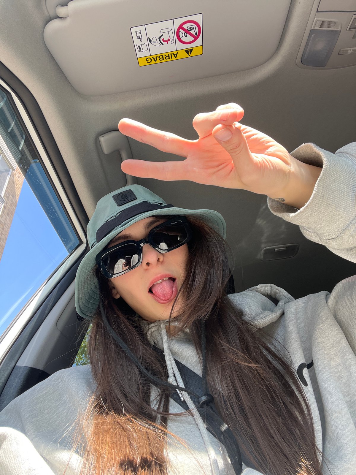 Young women take car selfies in Krasnoyarsk