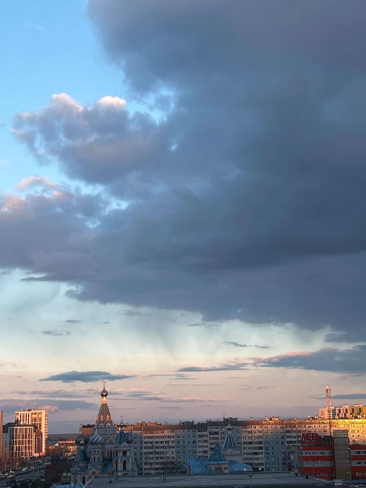 Dramatic sunset cityscape documented in Izhevsk, Russia