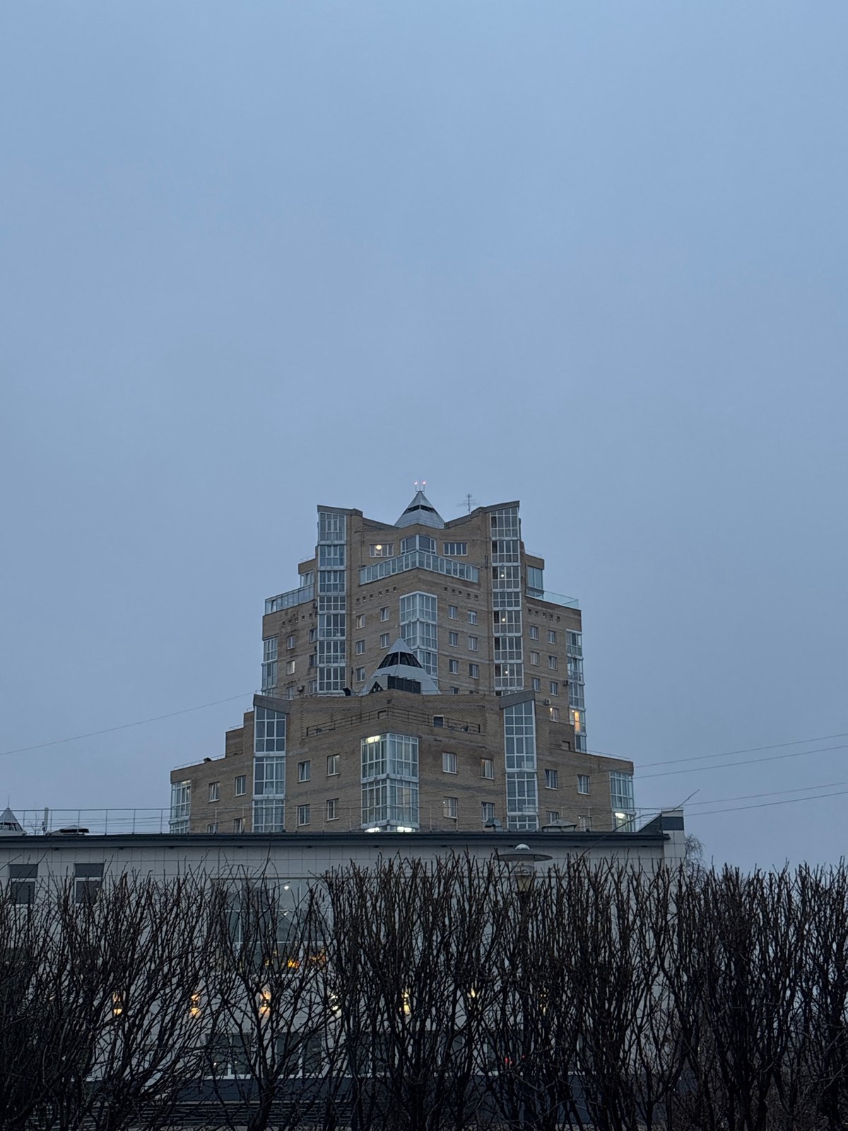 Person documents Perm cityscape near Olympia shopping center