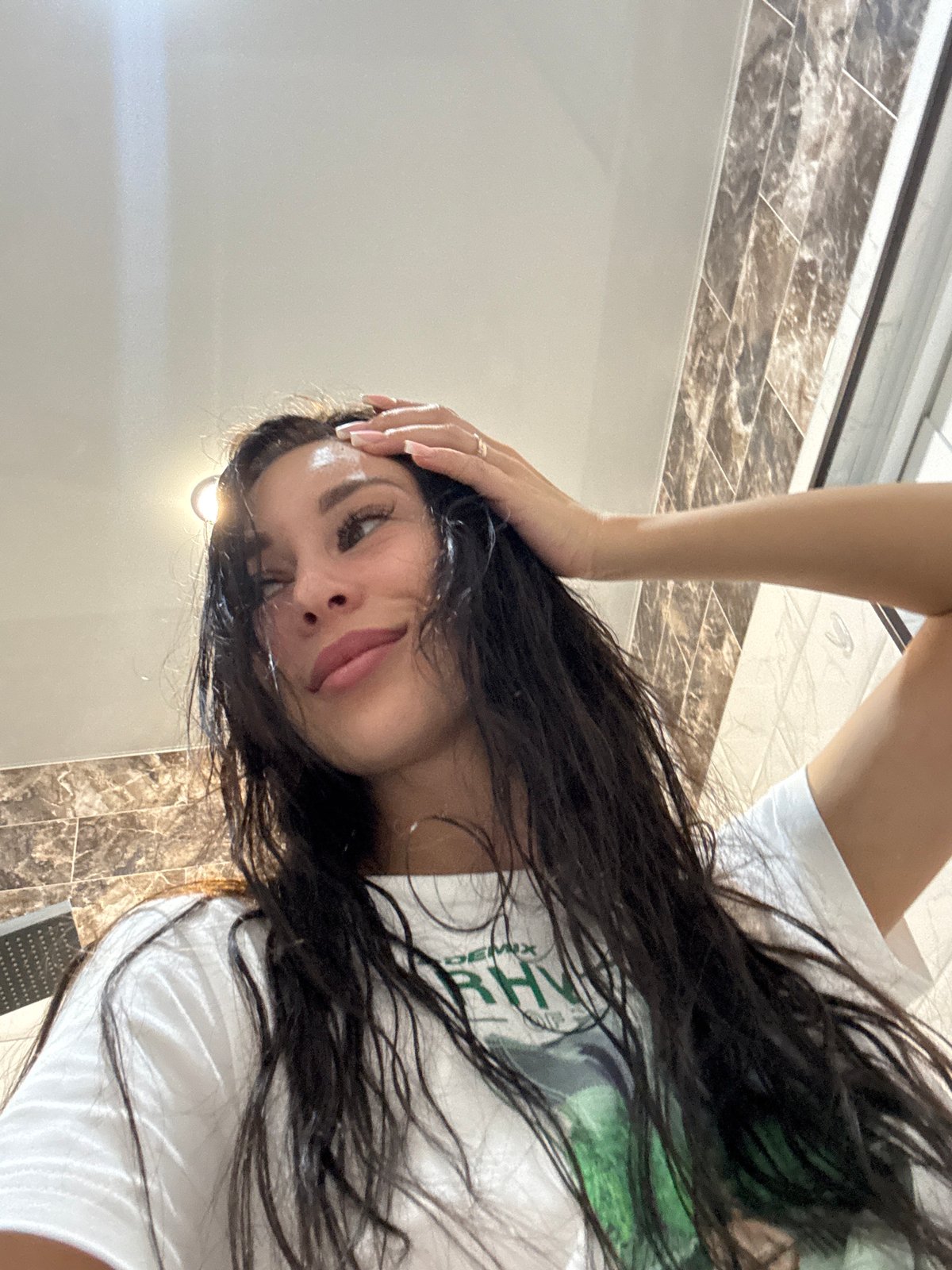 Woman photographed in multiple indoor poses in Chaikovsky, Russia
