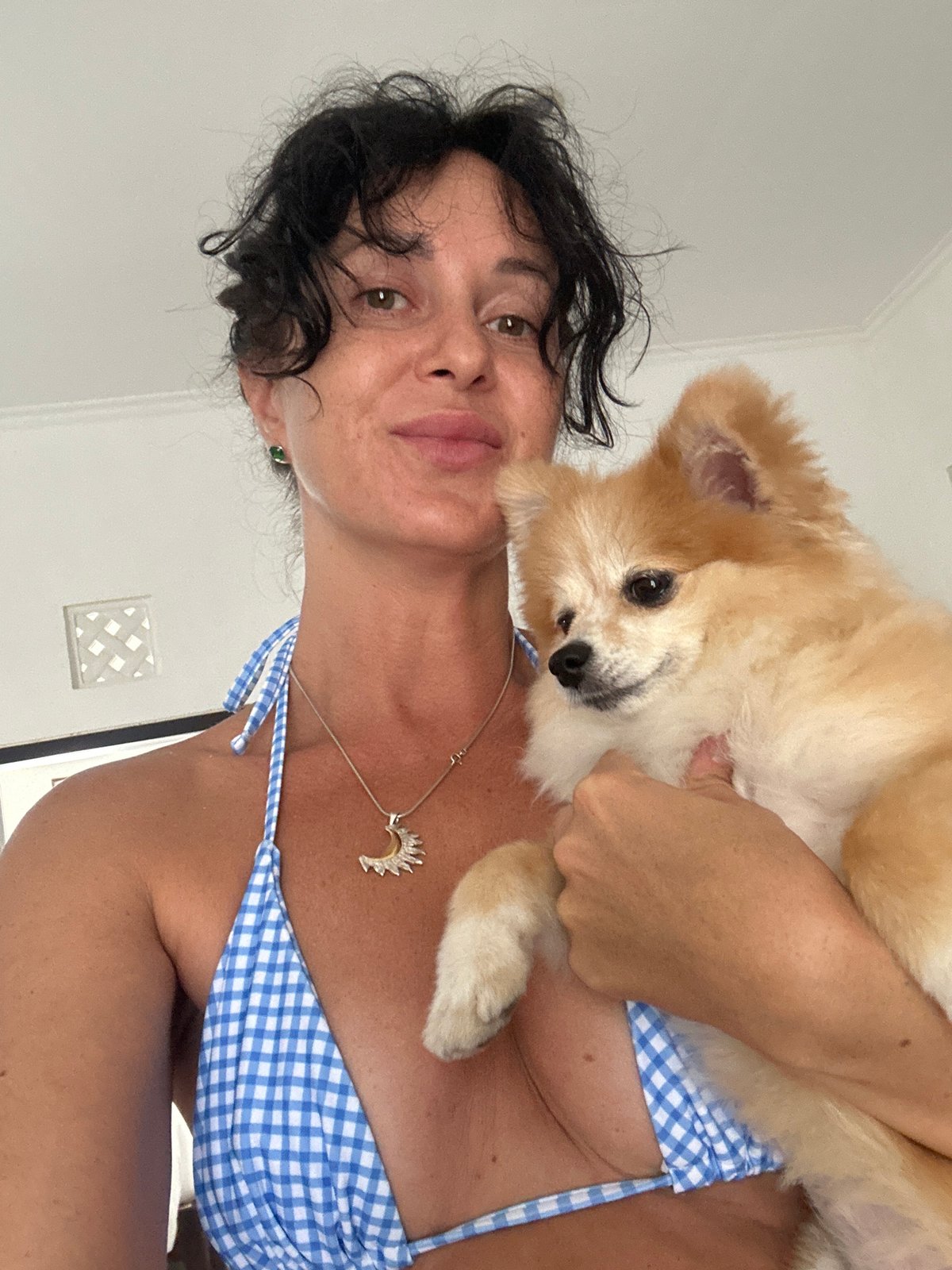 Mirror selfies with a Pomeranian, Bali villa getaway