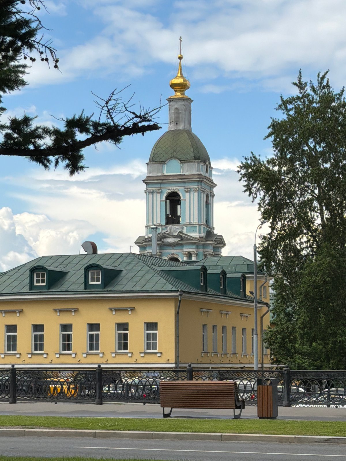 Woman documents casual walking tour of Podolsk landmarks