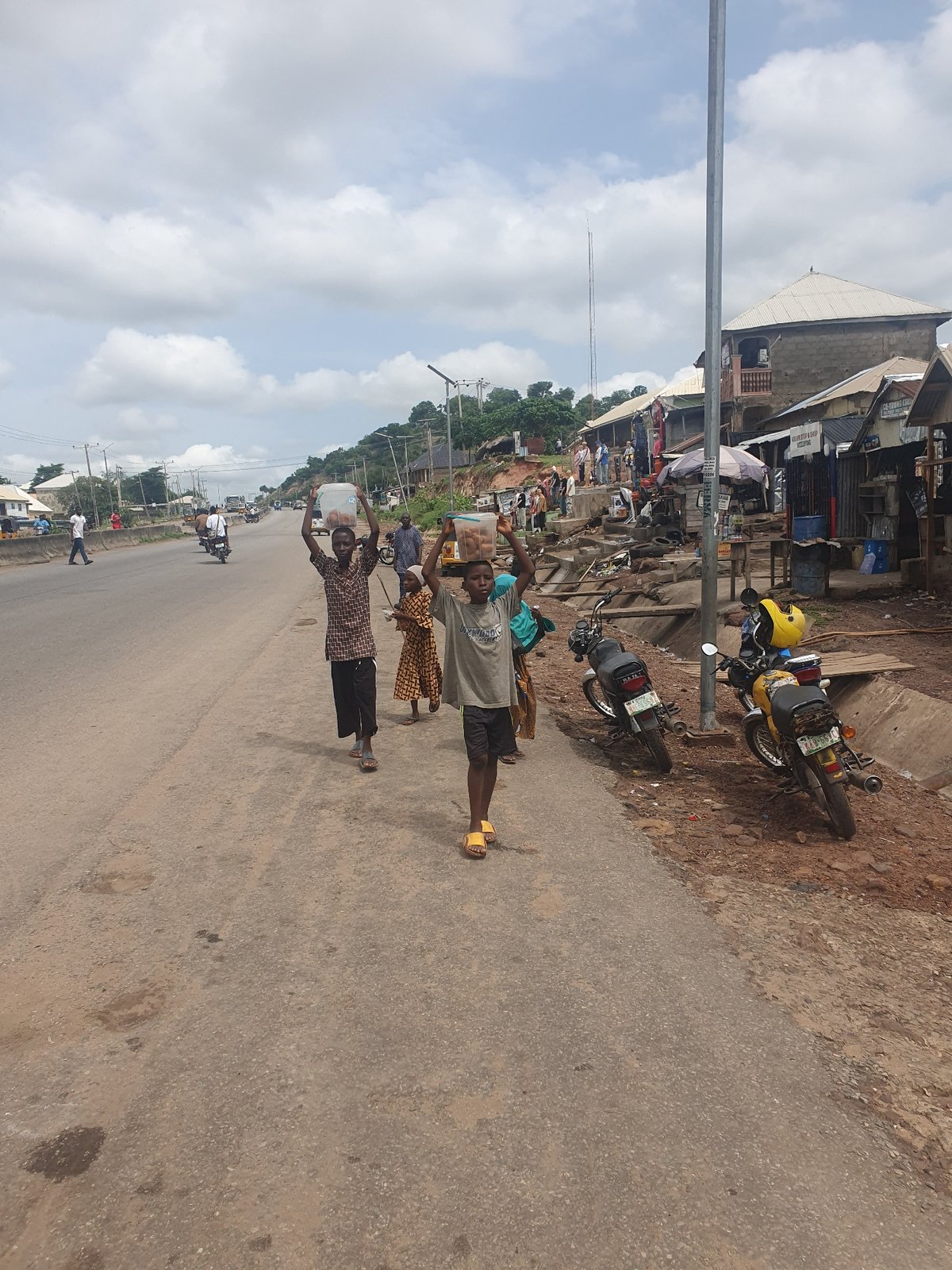 Daily street life documented in Lokoja, Nigeria morning hours