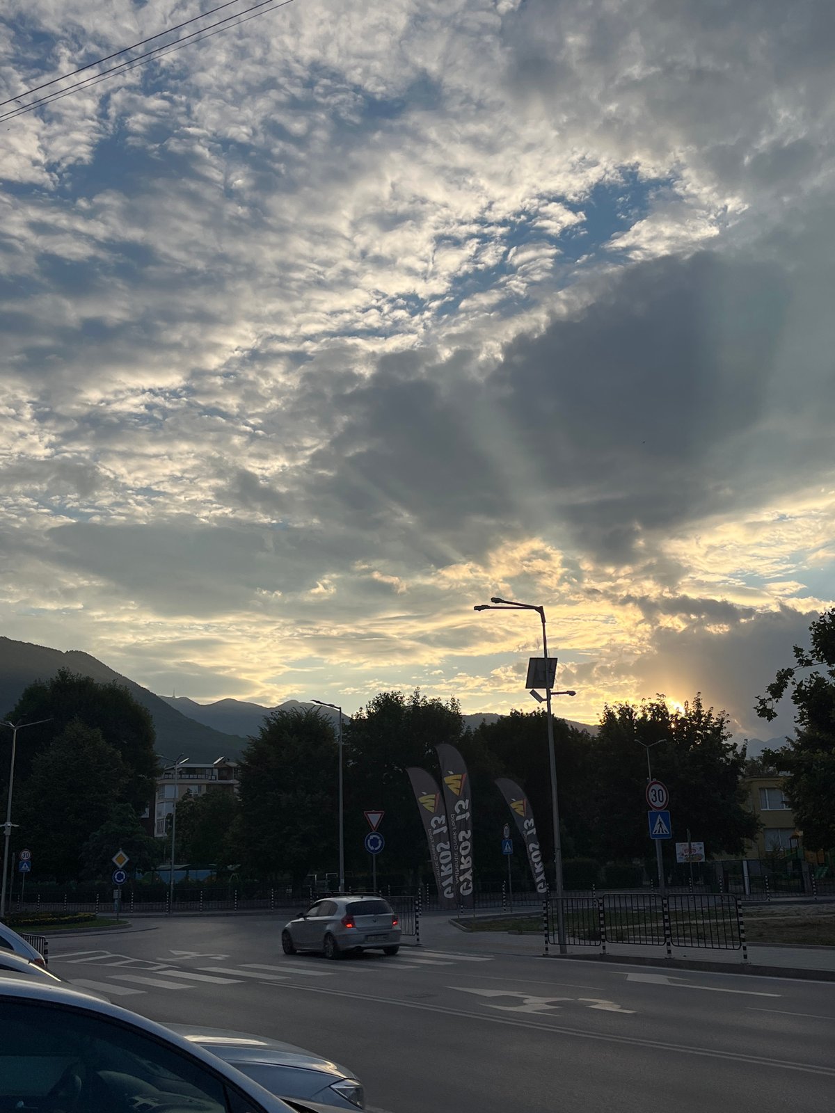 Golden hour light over Gotse Delchev streets and mountains