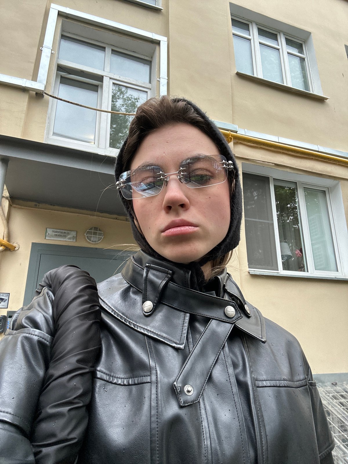 Selfie session on Moscow streets, futuristic sunglasses and black leather