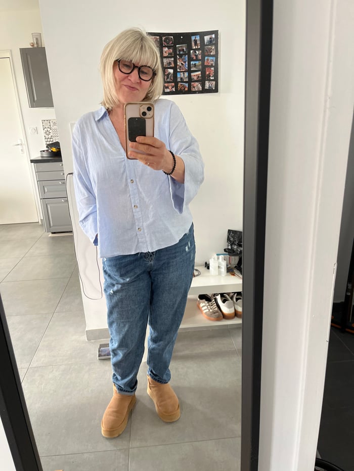 Woman documents morning cooking routine with dog in French kitchen