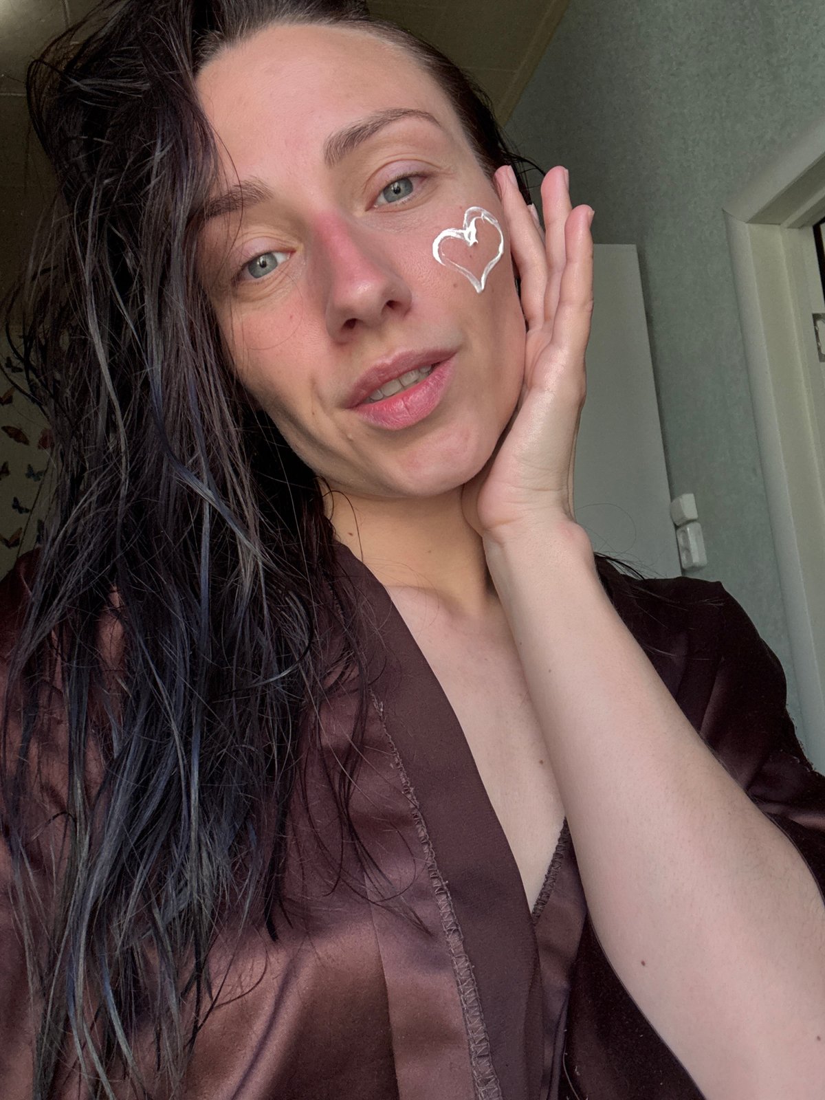 Skincare routine and cat playtime recorded in Saint Petersburg bedroom