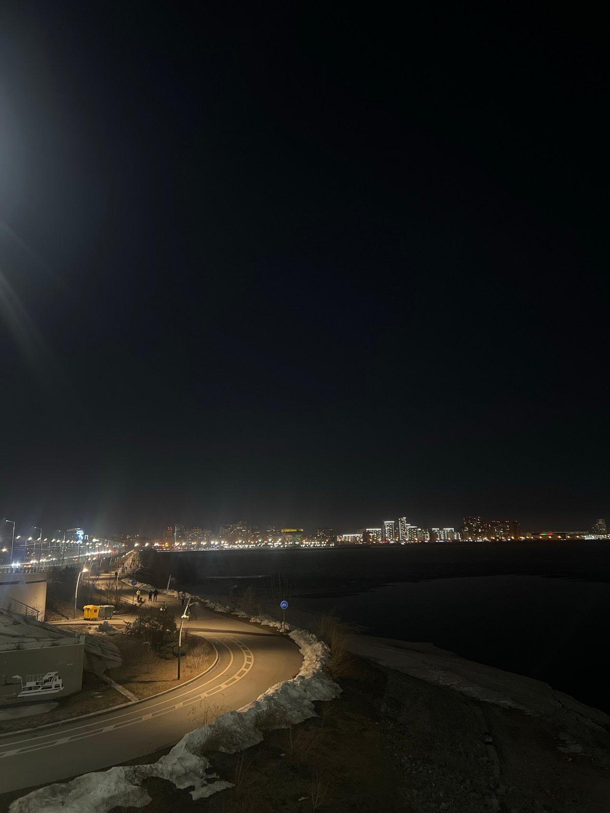 Nighttime scenes captured across illuminated Kazan landmarks and streets