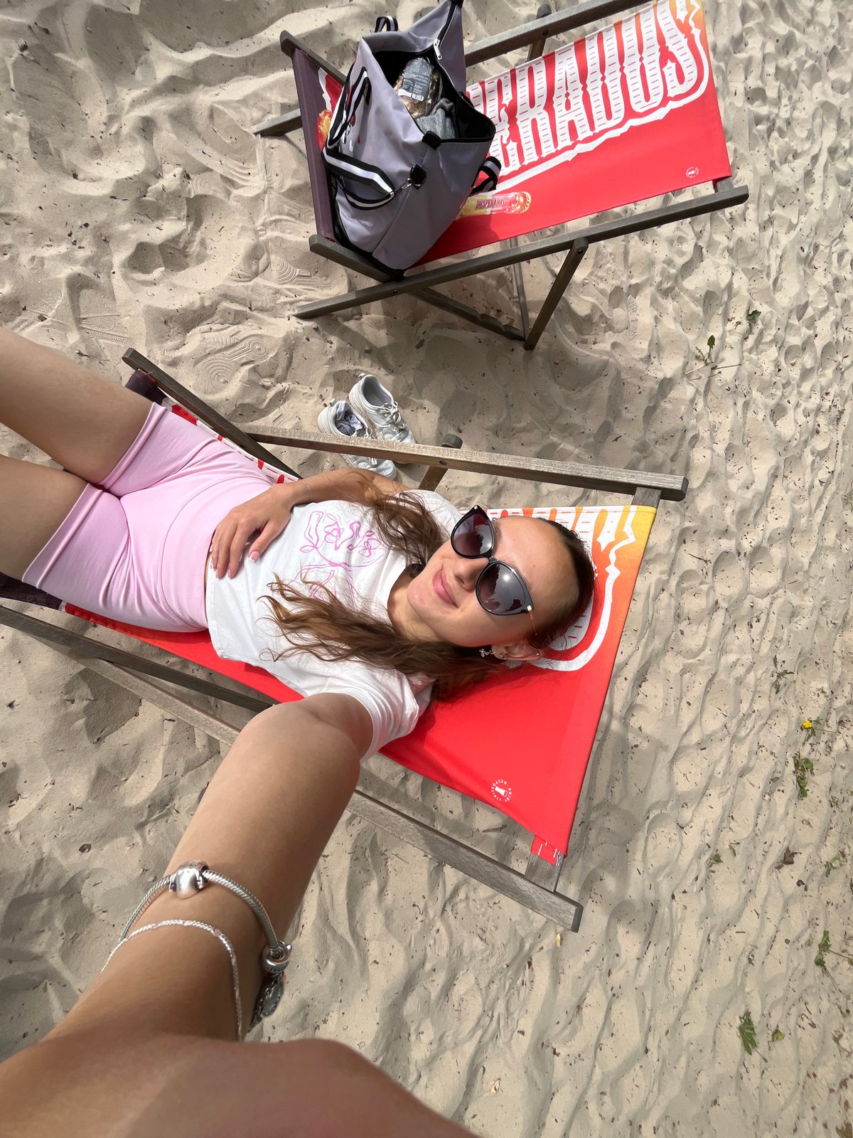 Woman documents sunny afternoon leisure time in Saarbrücken