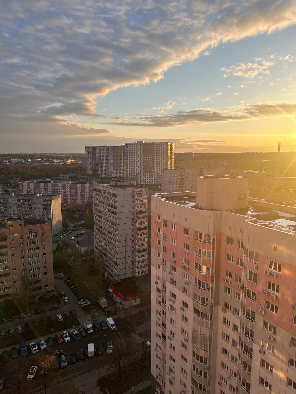 Resident observes cityscape from apartment window in Krasnogorsk
