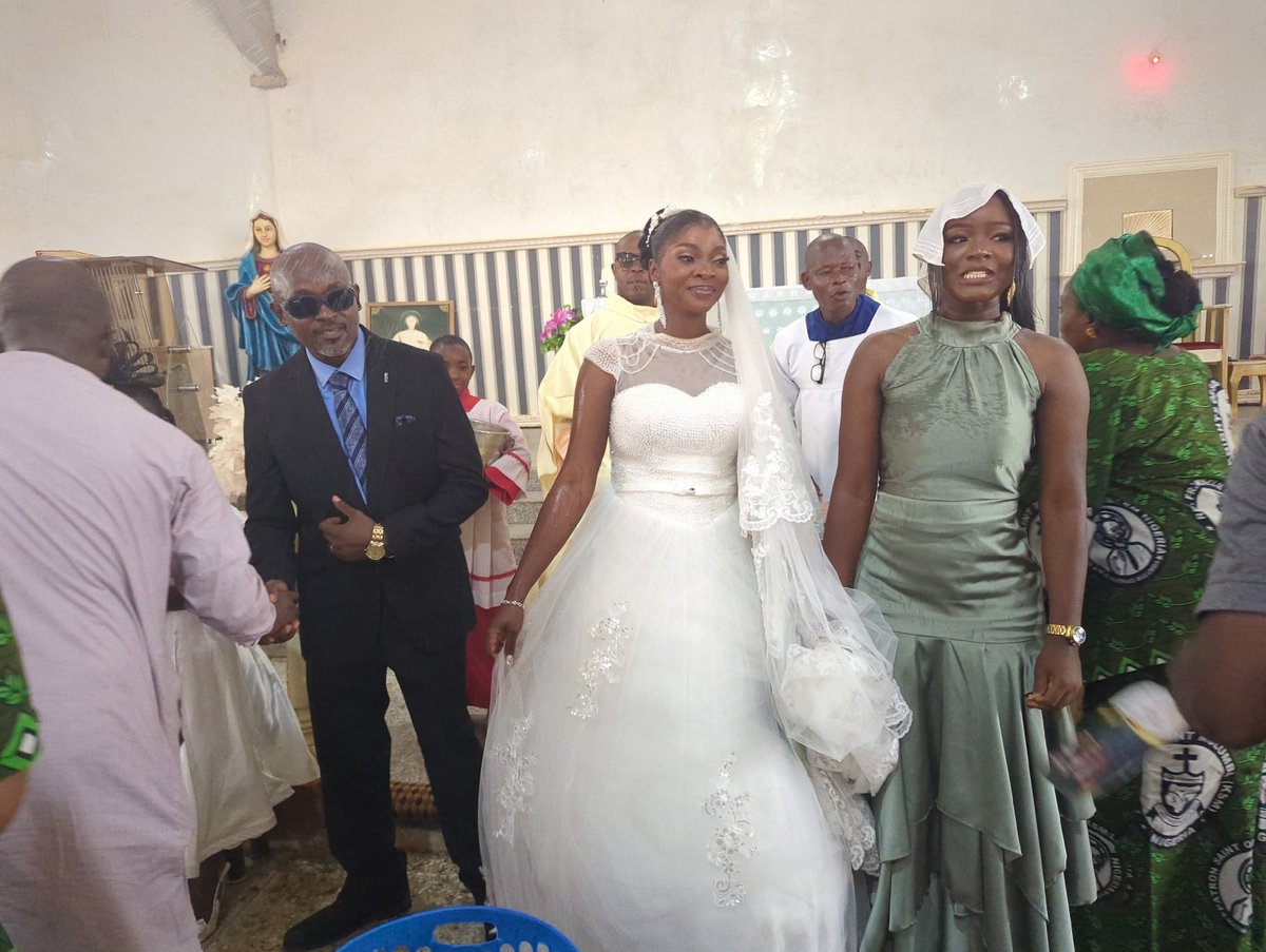 Wedding ceremony held at church with traditional attire