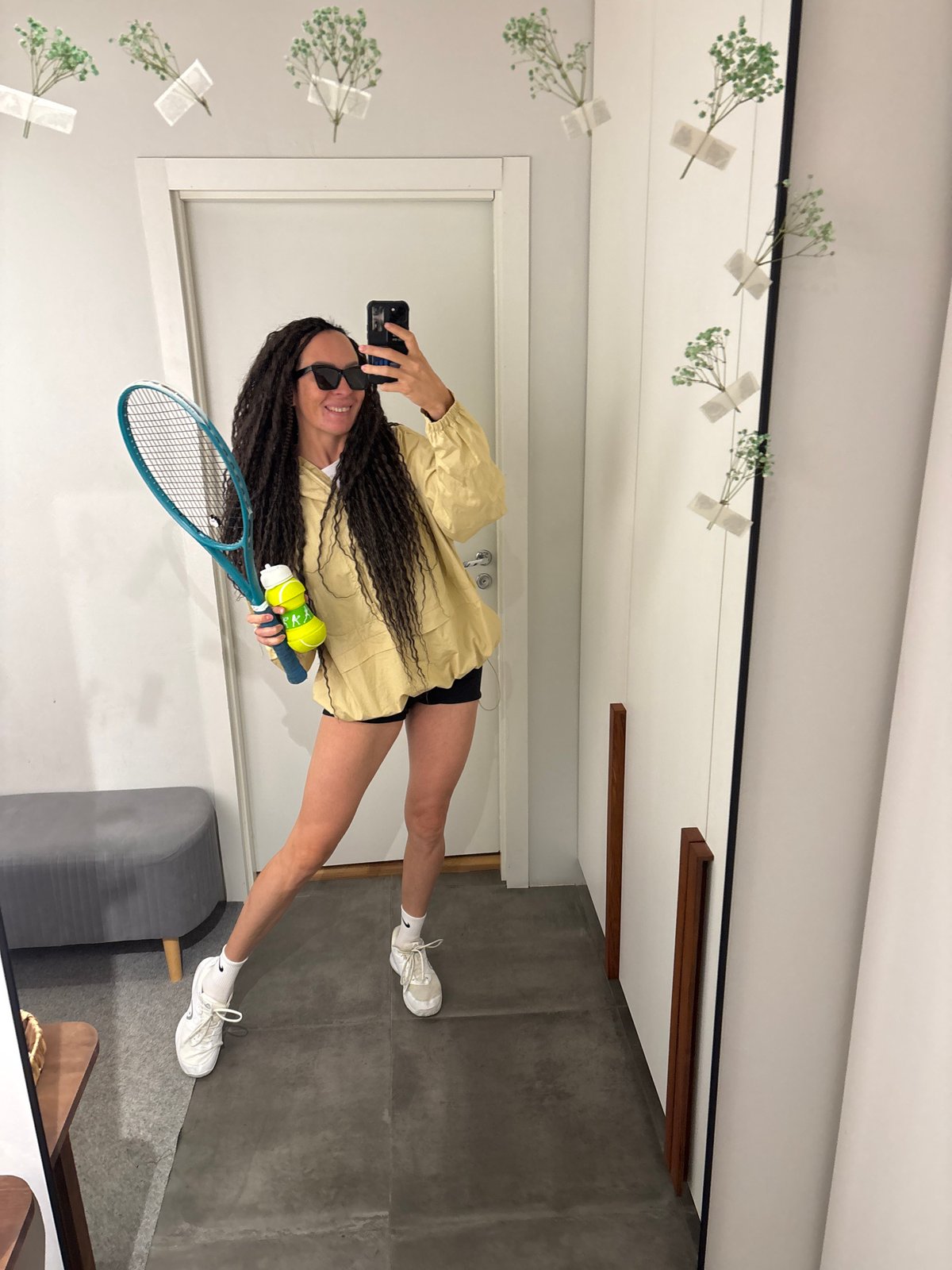 Woman takes mirror selfies in Chaikovsky, Russia early morning