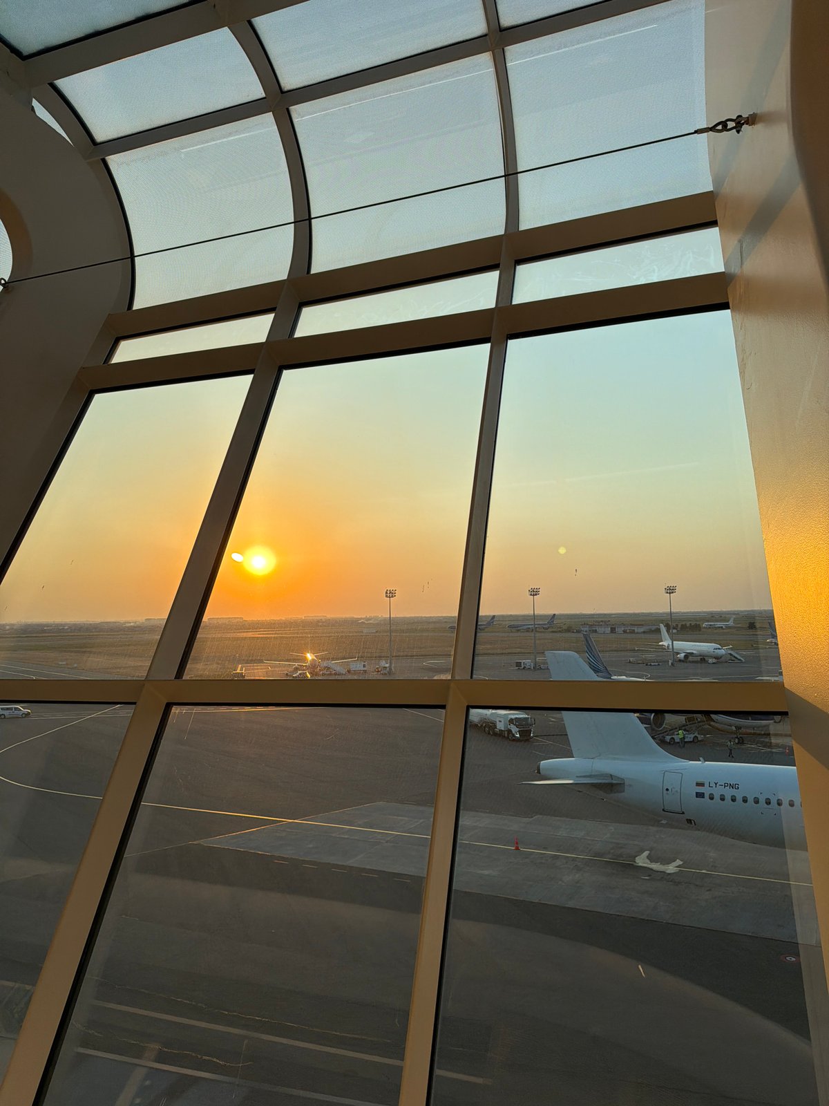 Inside Baku's airport terminal at sunset, July 2026