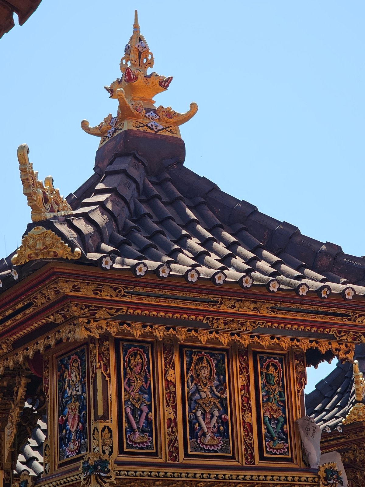 Witness documents Balinese temples and street life in Denpasar