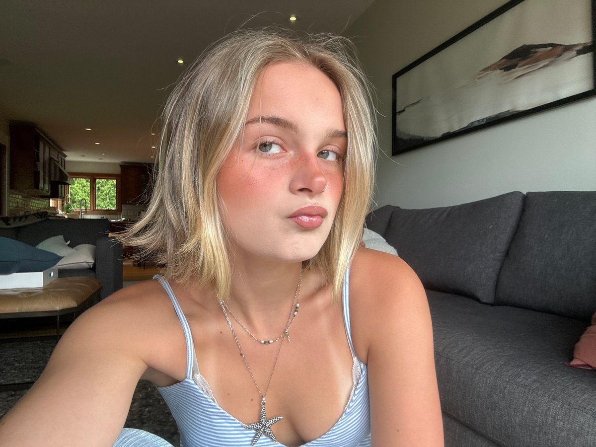 Woman takes selfies with dog in Squamish home