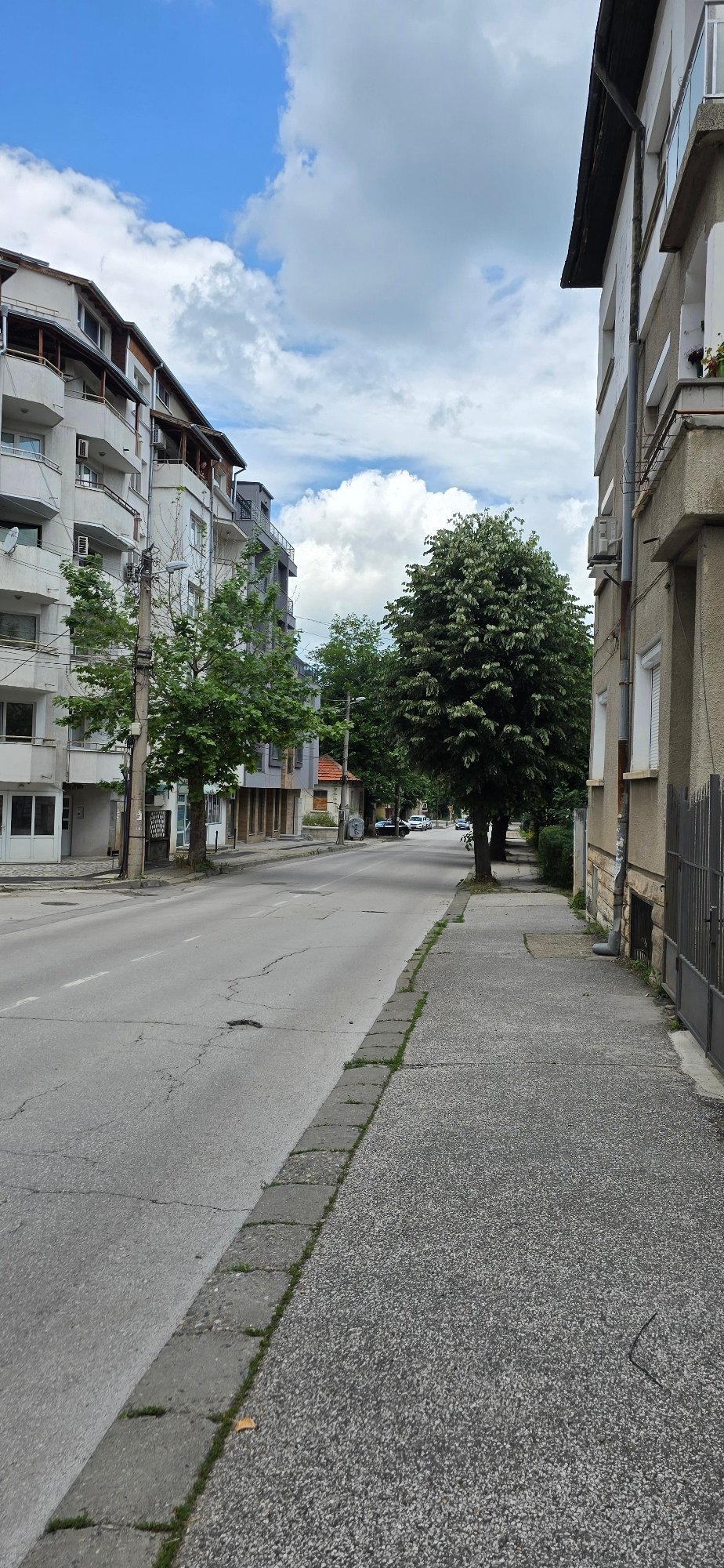 Urban scenes documented across unknown city during morning hours