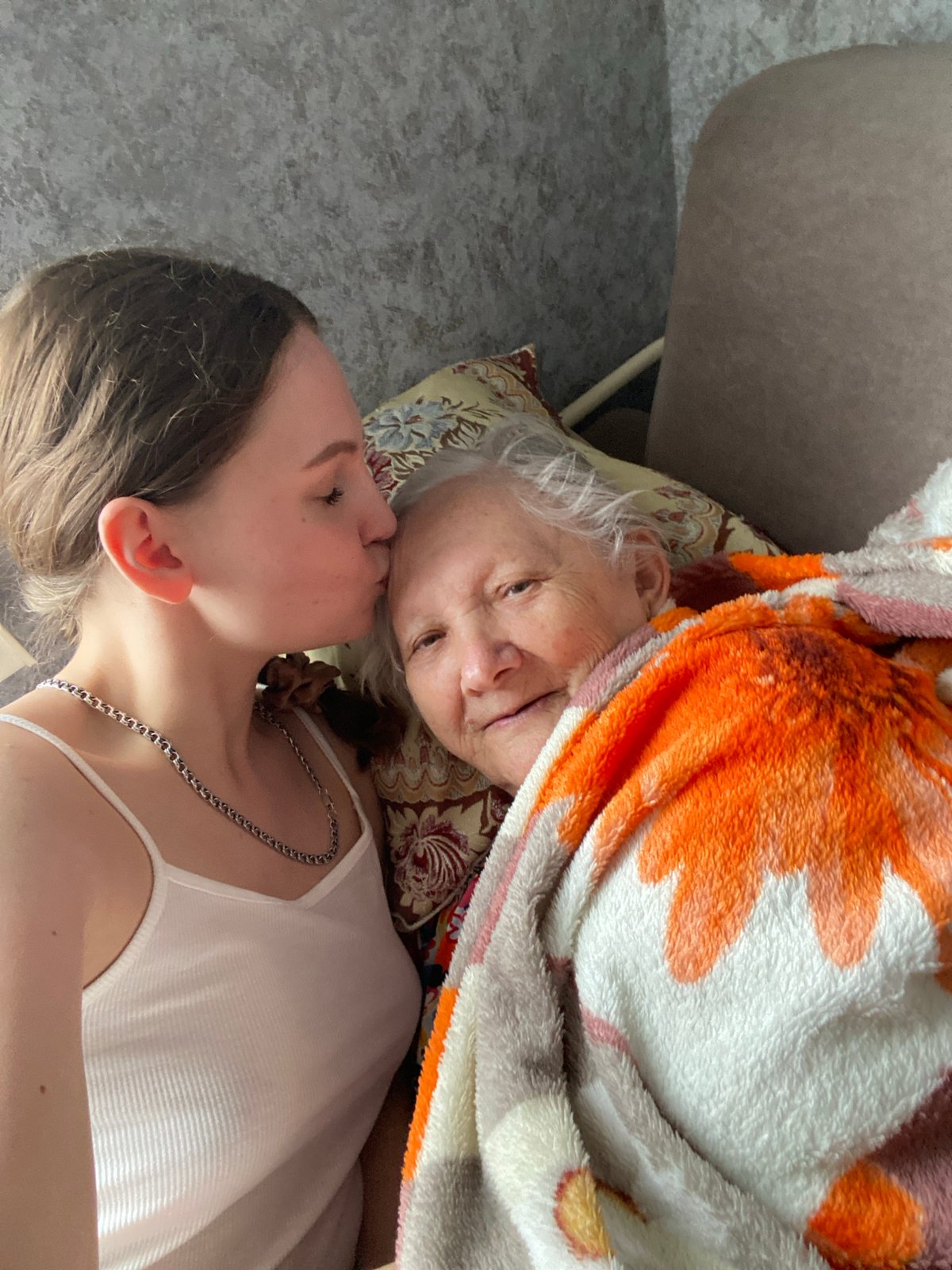 Young women document casual moments through selfies in Марковский