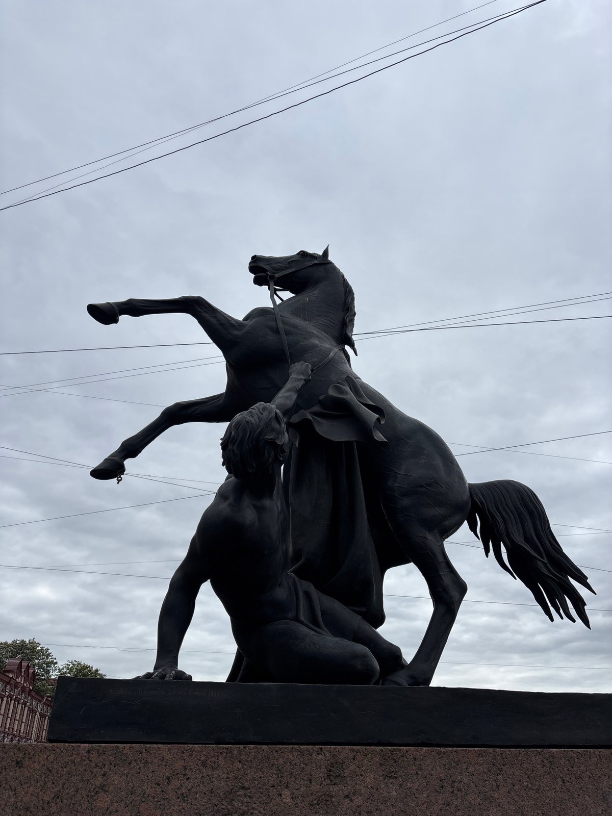 Tourist documents Saint Petersburg's architecture and landmarks during morning walk