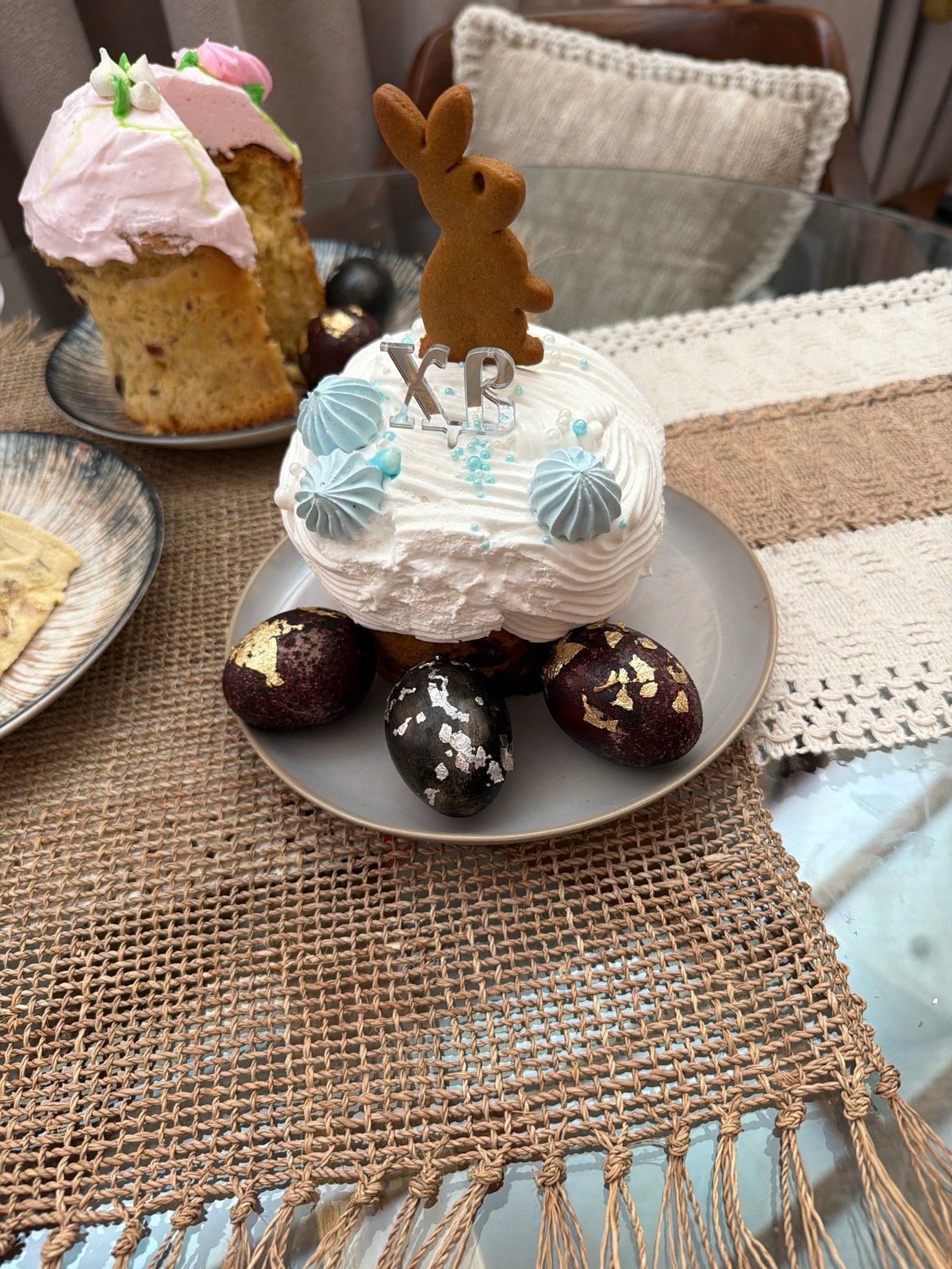 Early morning Easter celebration captured with decorated eggs and cake