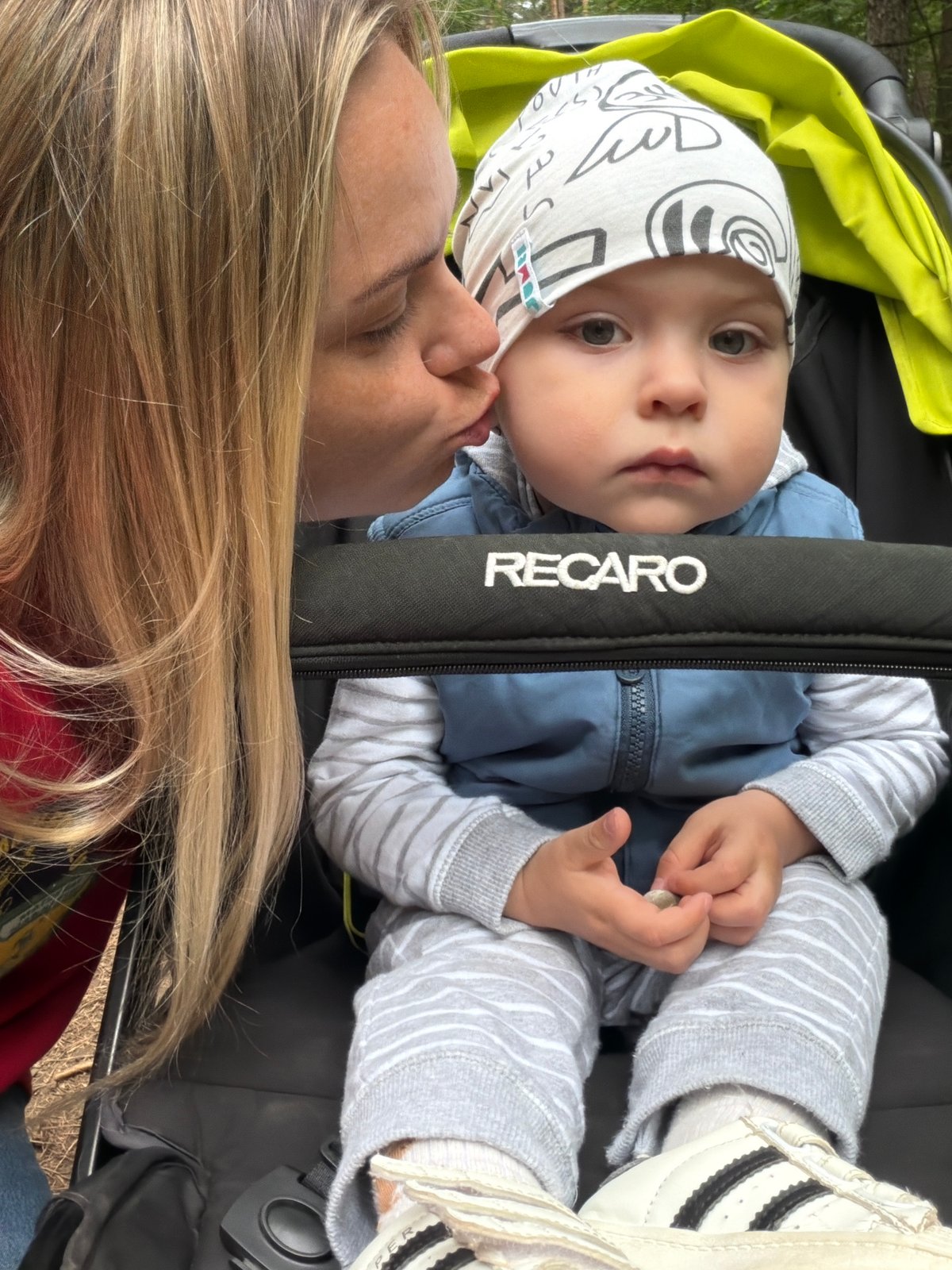Woman takes baby for forest walk in Votkinsk, Russia