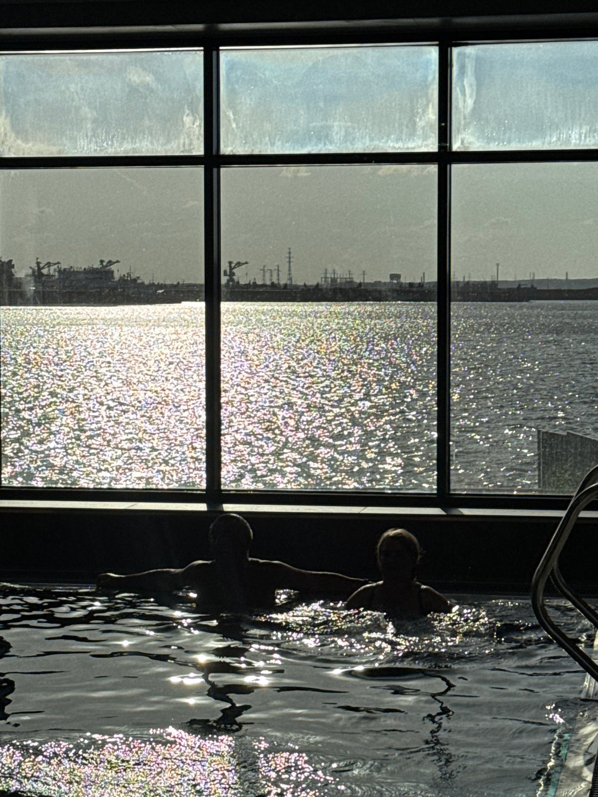 Family leisure day documented across Chaikovsky swimming pool and playground