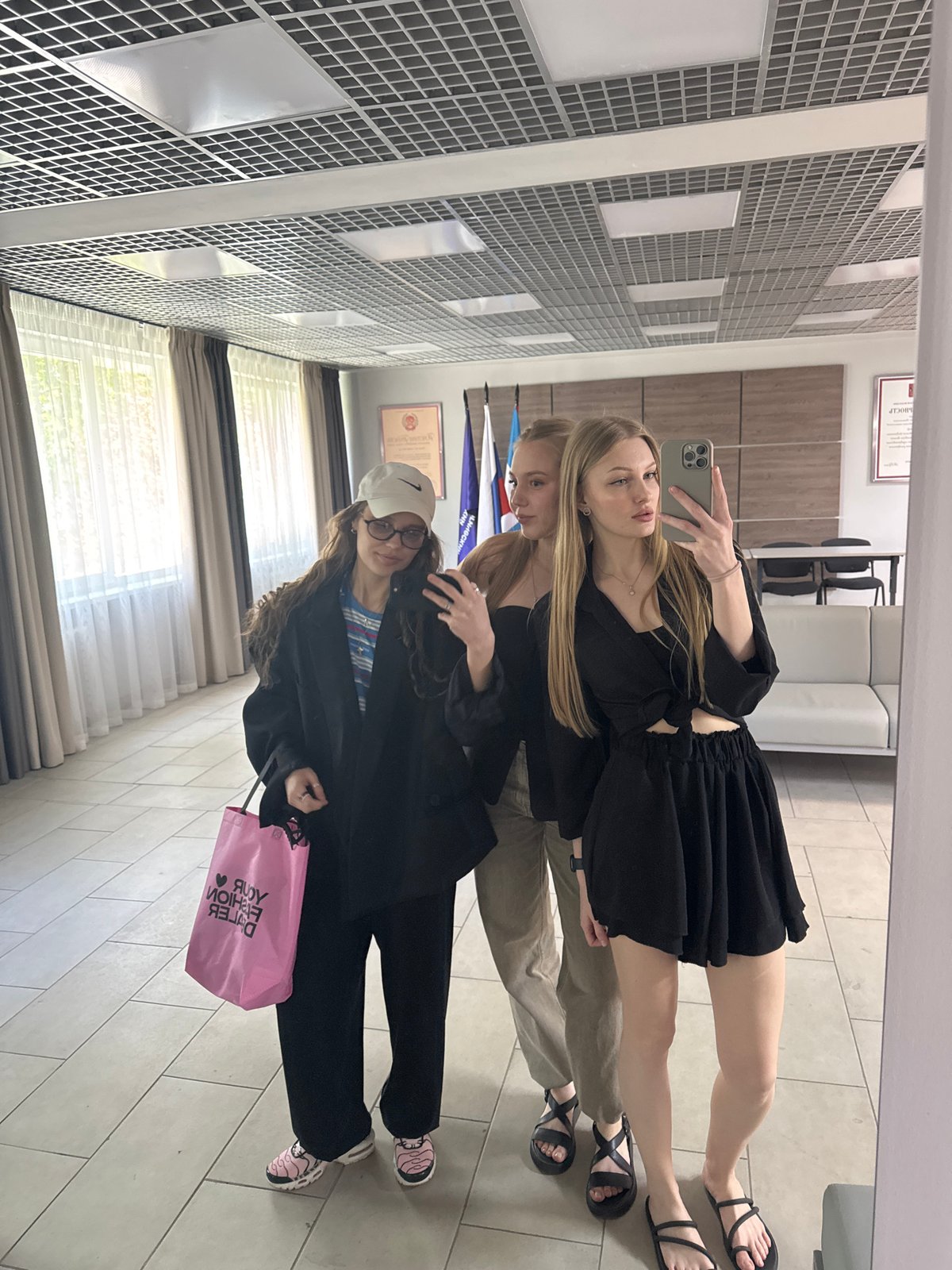 Women photographed taking selfies around Perm, Russia