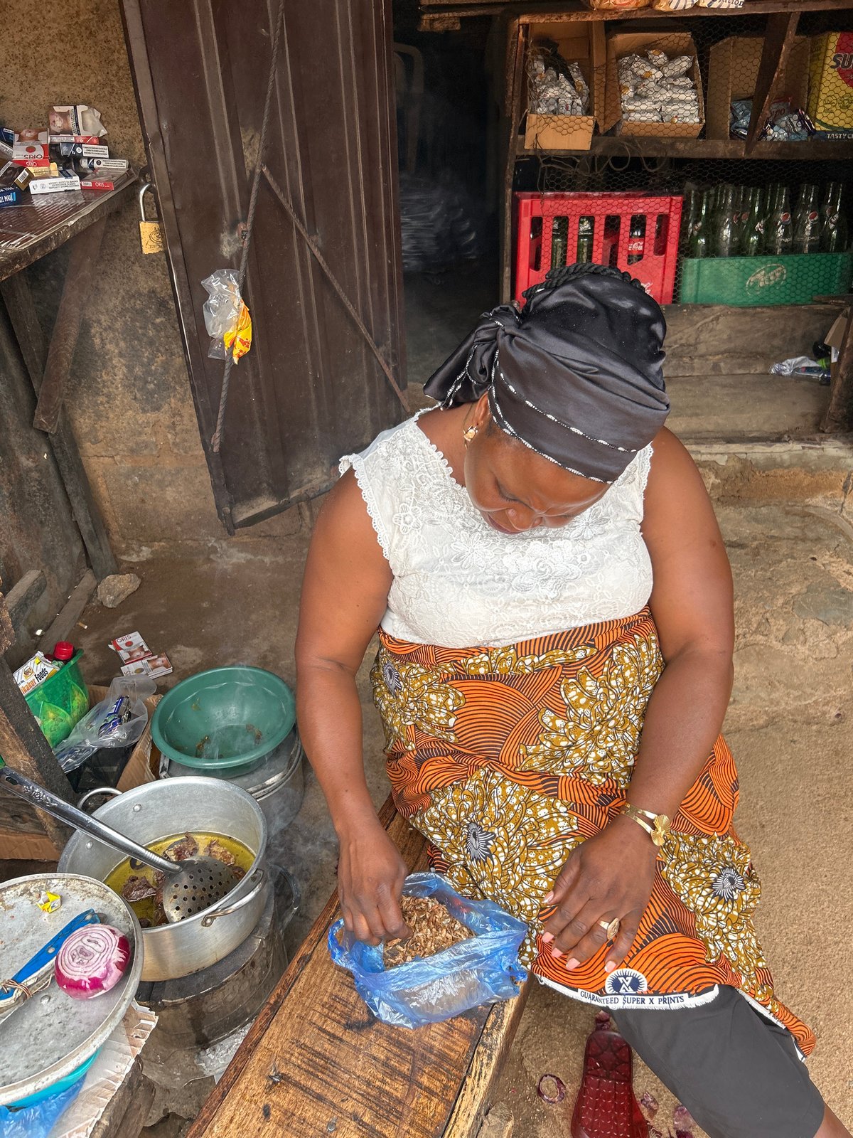 Everyday street life across a busy Jos morning