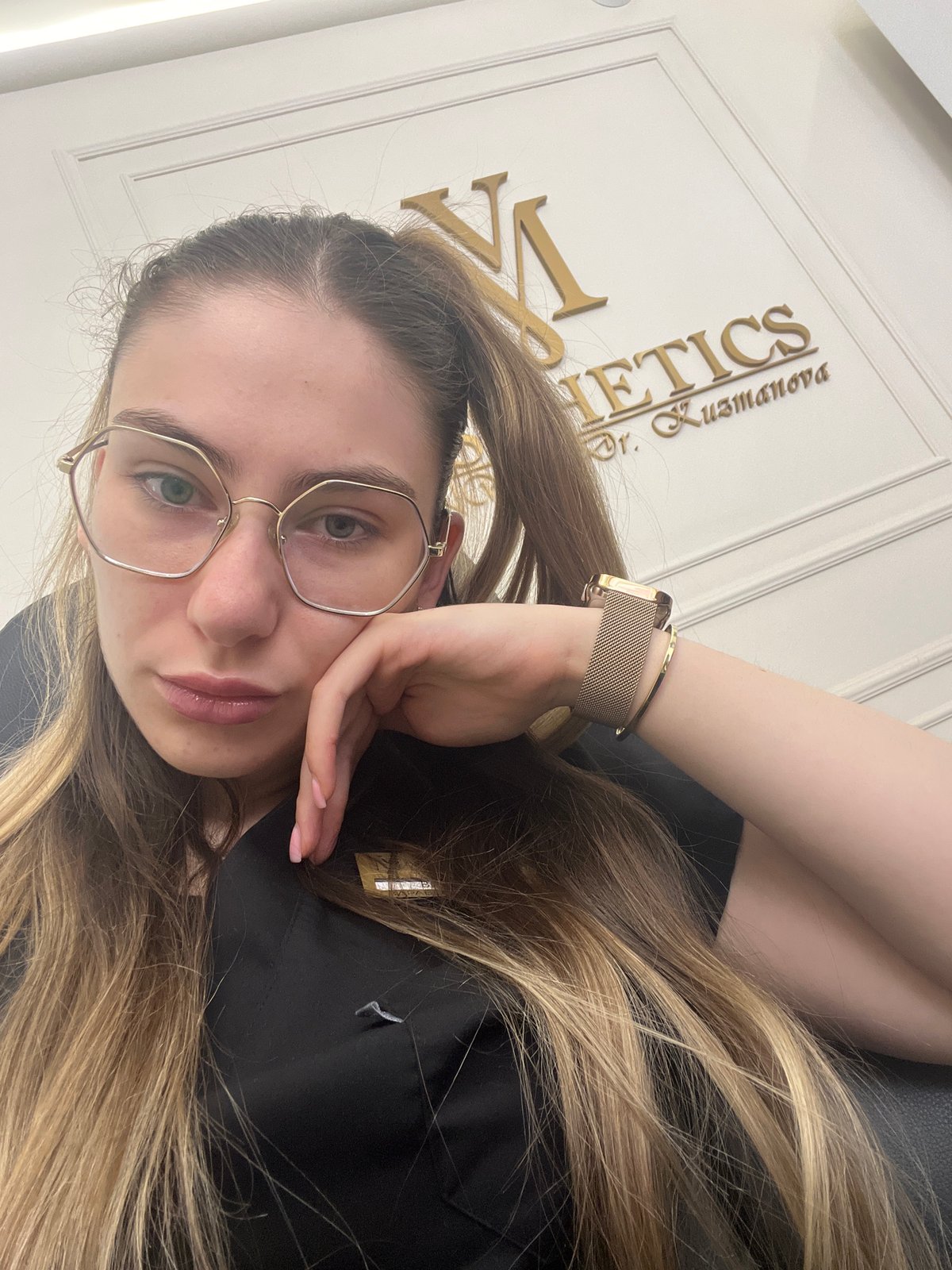 Selfie series featuring hexagonal glasses and a black embroidered top