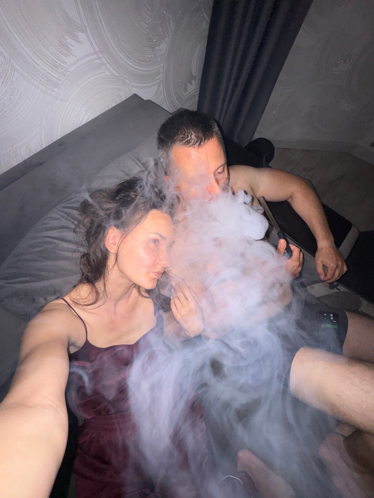 Couple shares hookah during evening at Sochi residence