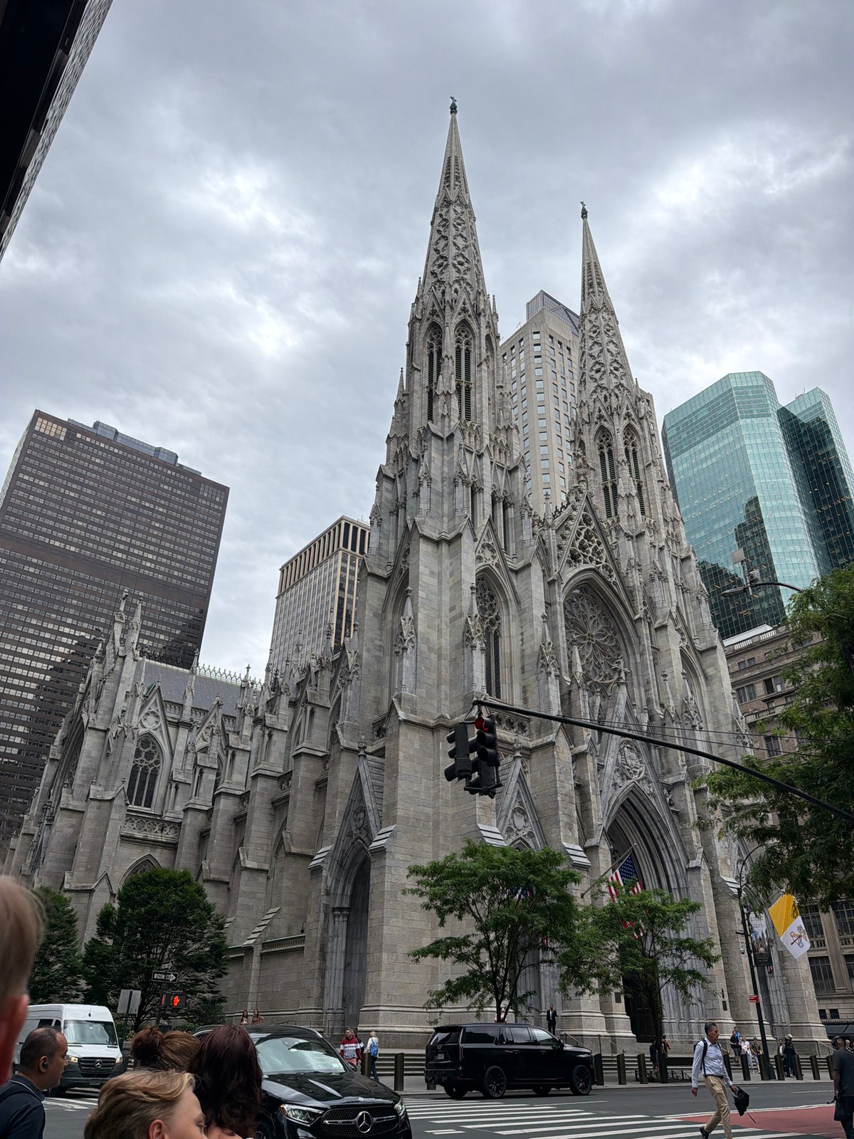 Midtown Manhattan afternoon: Pride flags, landmarks, and retail stops