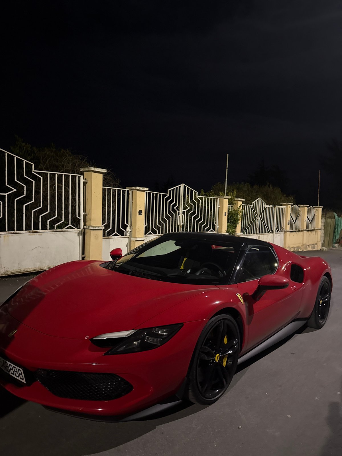 Red Ferrari spotted parked on Varna street at night