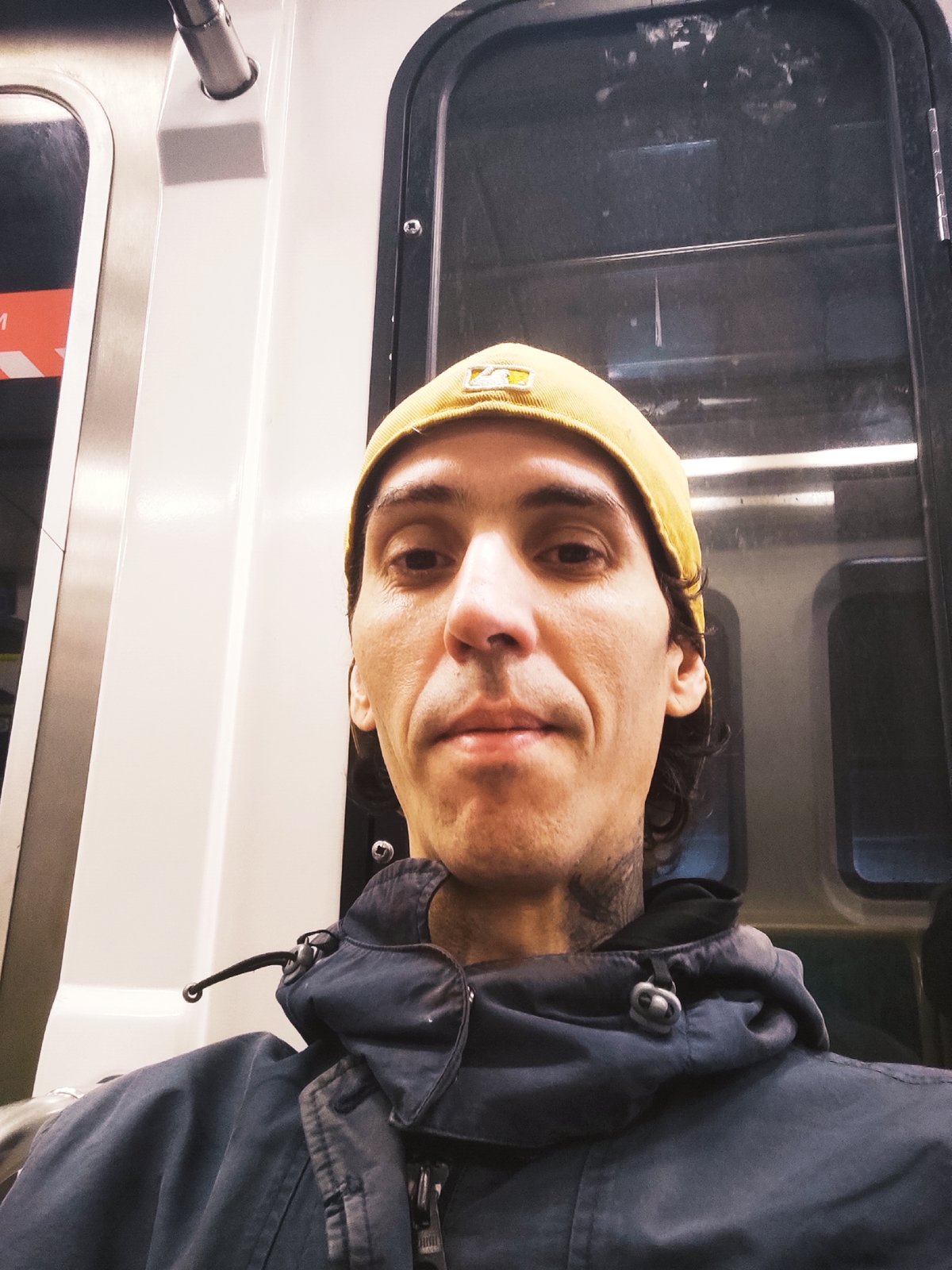 Man takes selfie on Buenos Aires train