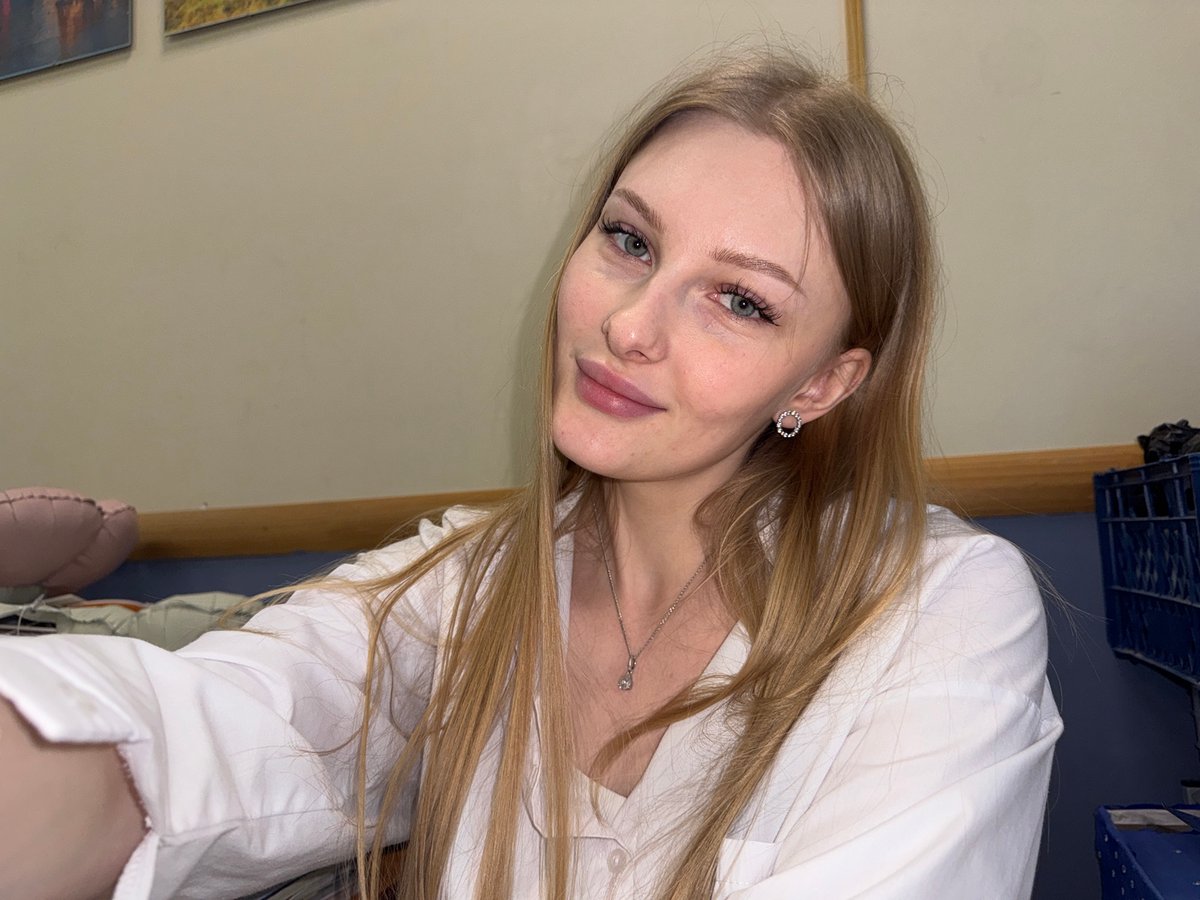 Woman photographed indoors in Perm, Russia