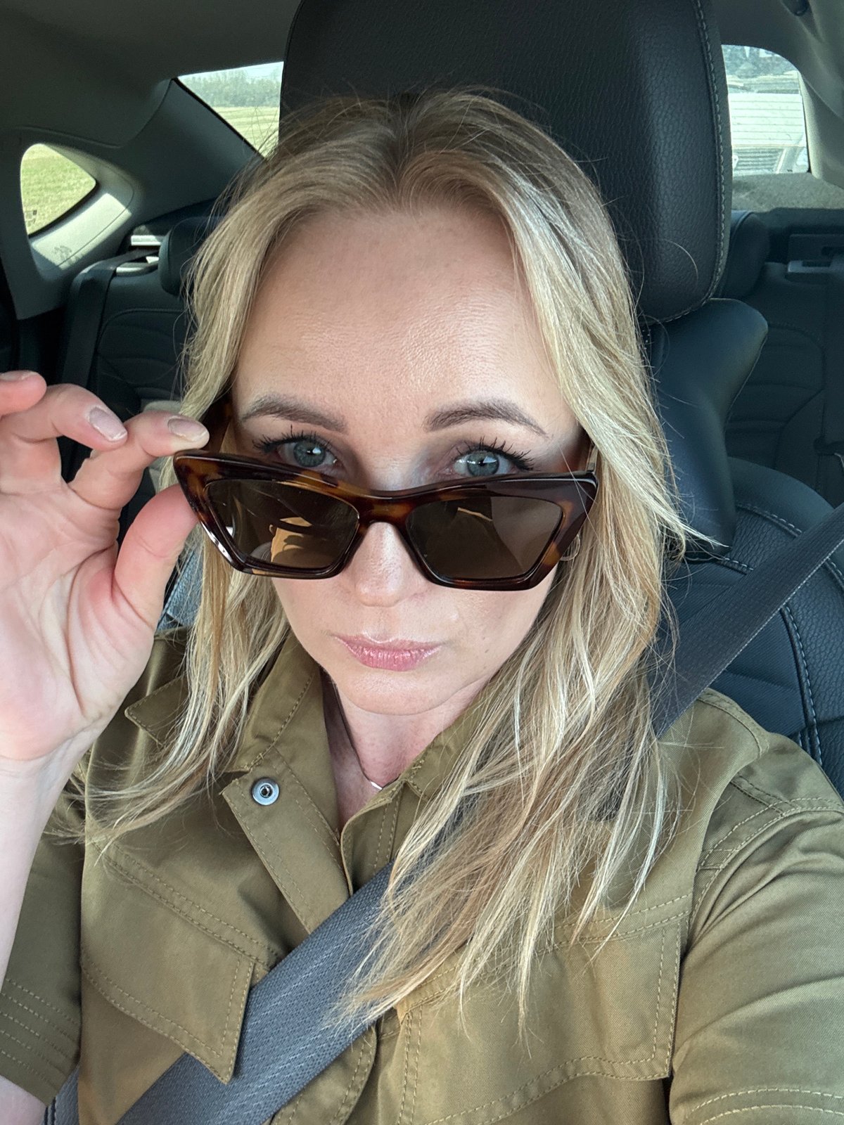 Woman takes car selfies in Gavrilovka, Russia