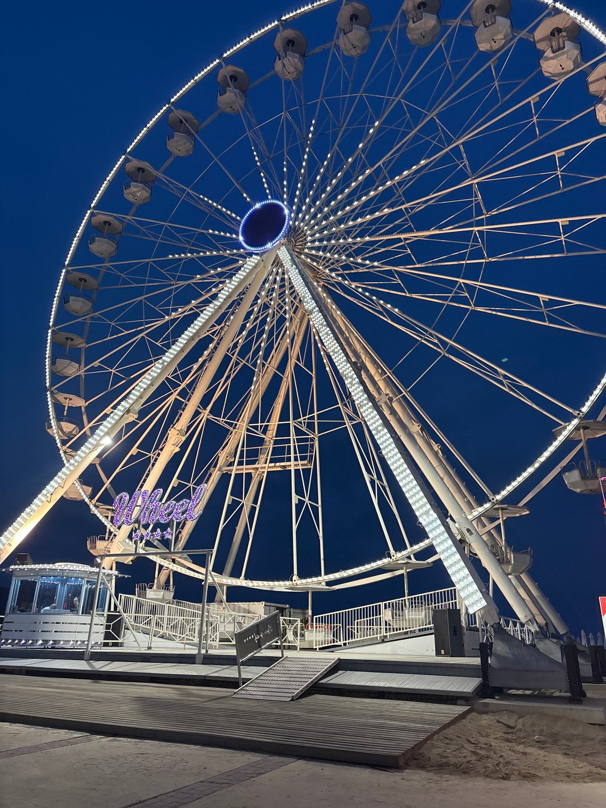 Illuminated Ferris wheel observed operating in Nesebar, Bulgaria