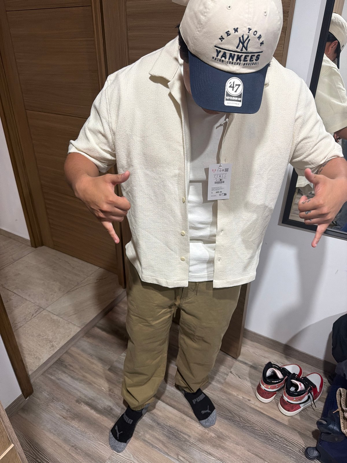 Person in casual wear observed indoors in San Andrés Cholula