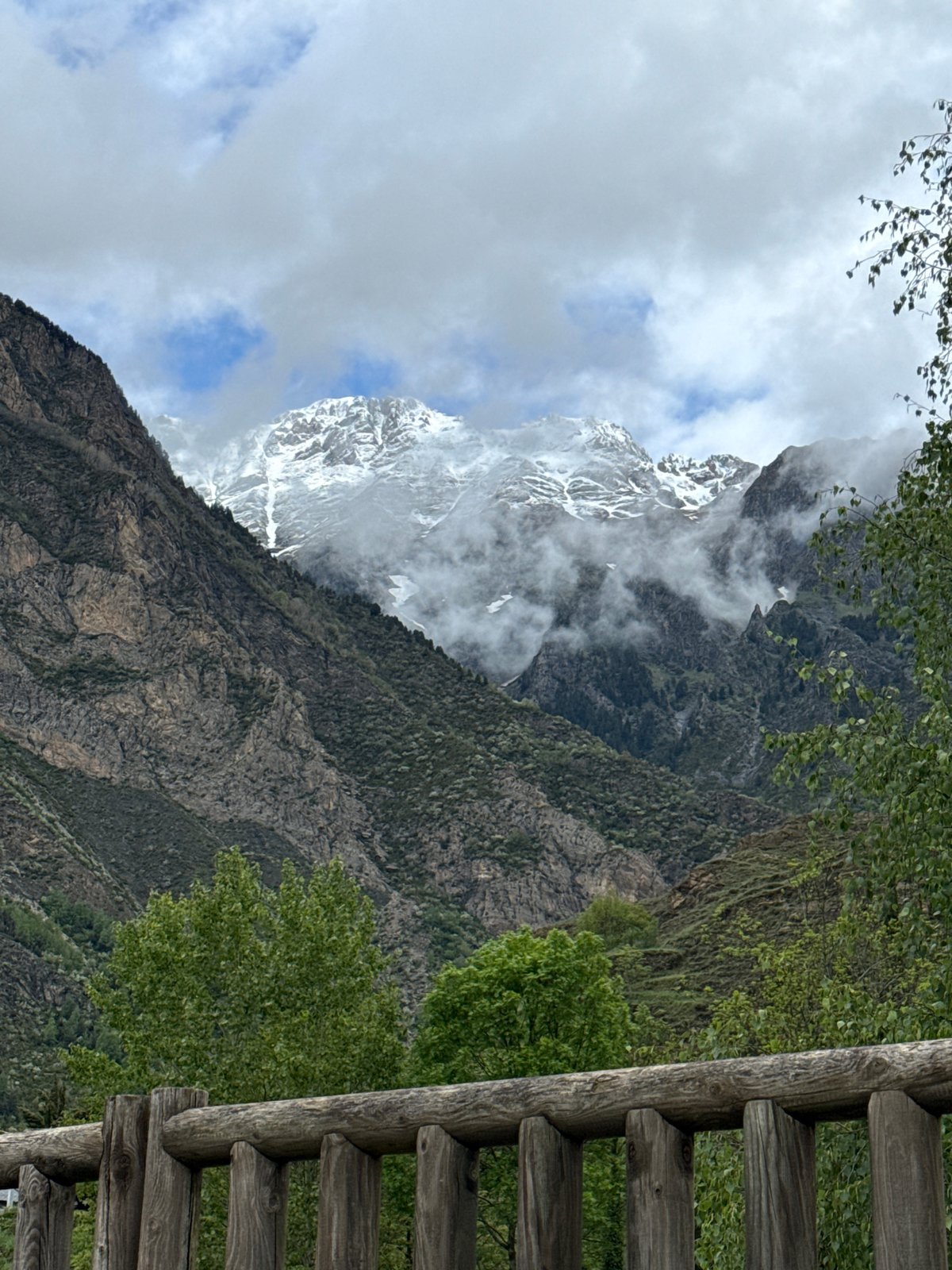 Mountain landscape photographed from Benasque viewpoint amid cloudy conditions