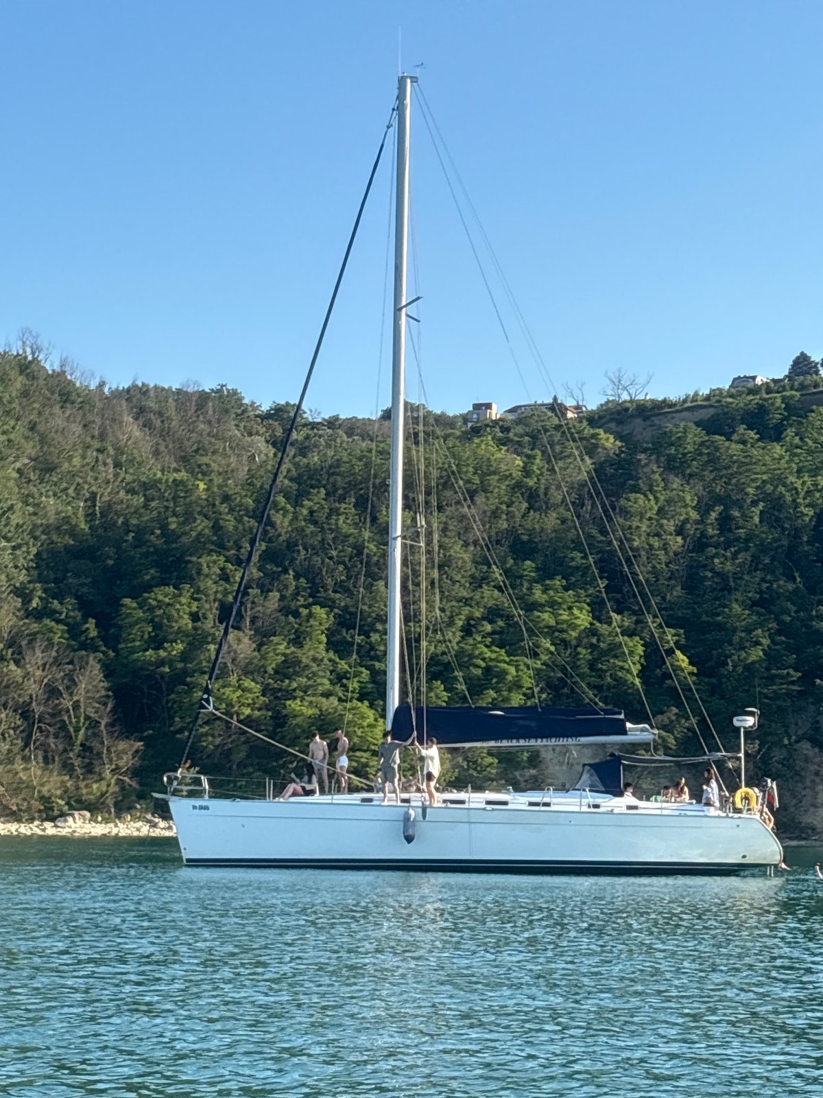 Lazy afternoon on the water near a lighthouse bay