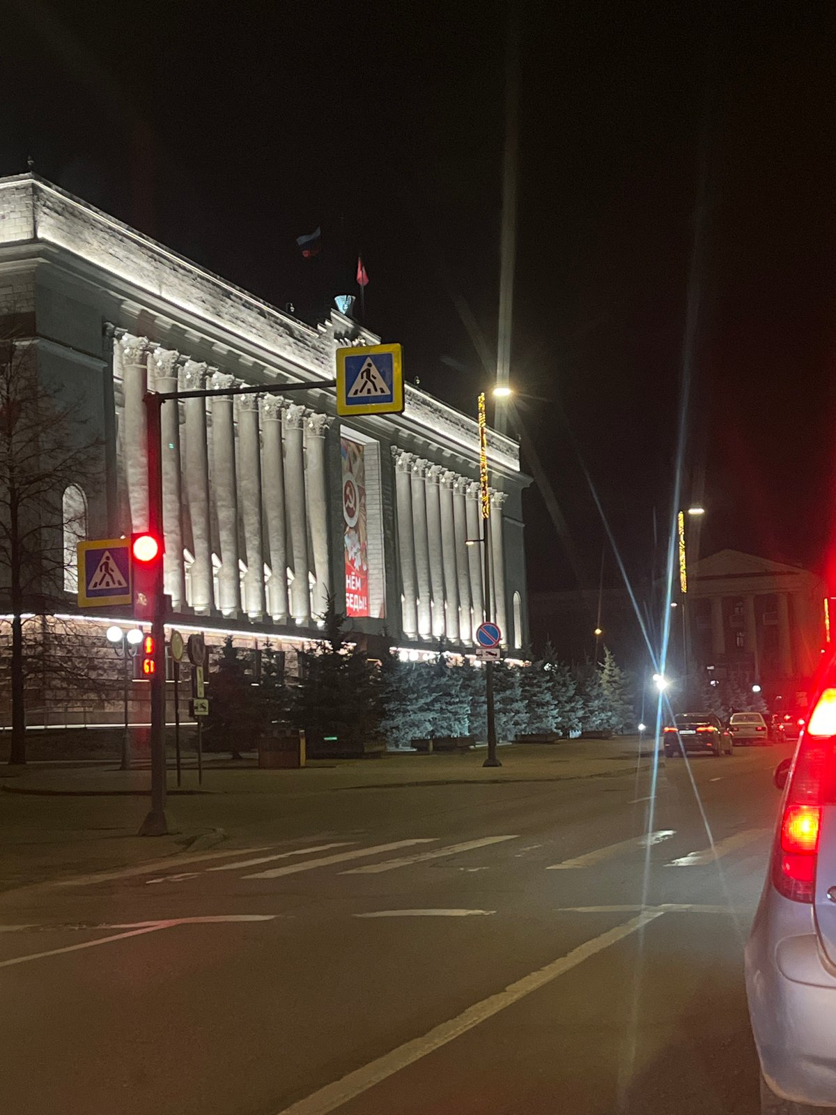 Witness documents nighttime building and modern interiors in Krasnoyarsk