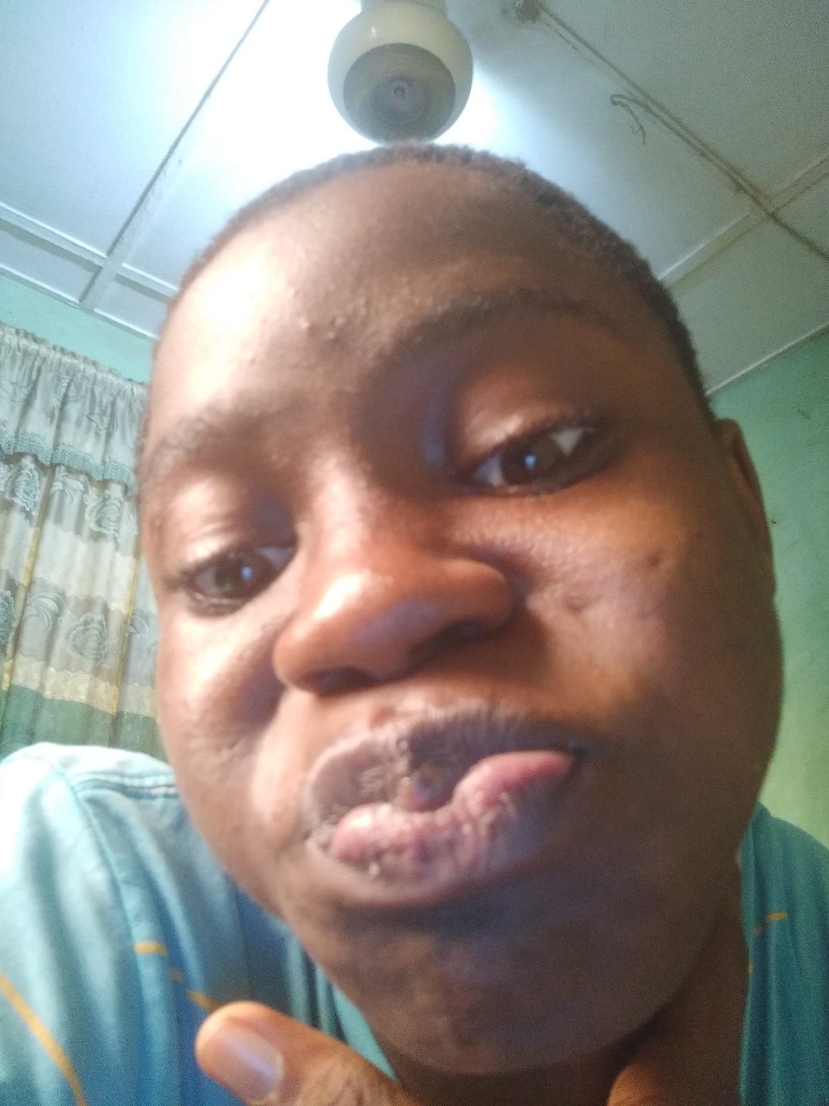 Person captures selfie series in Shangisha, Nigeria