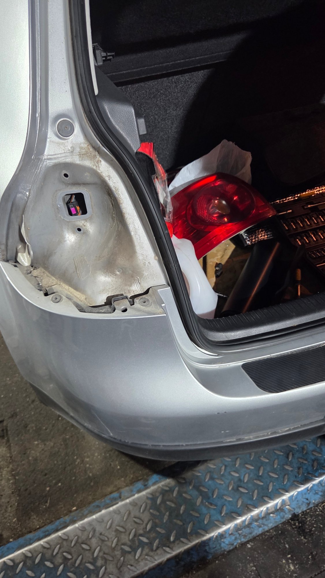 Car taillight work and pool maintenance at a residential property