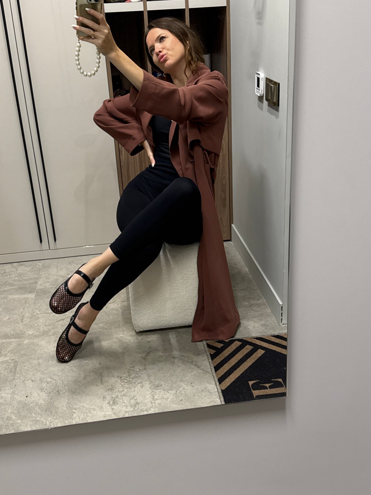 Outfit selfie in a Moscow dressing area, summer 2026